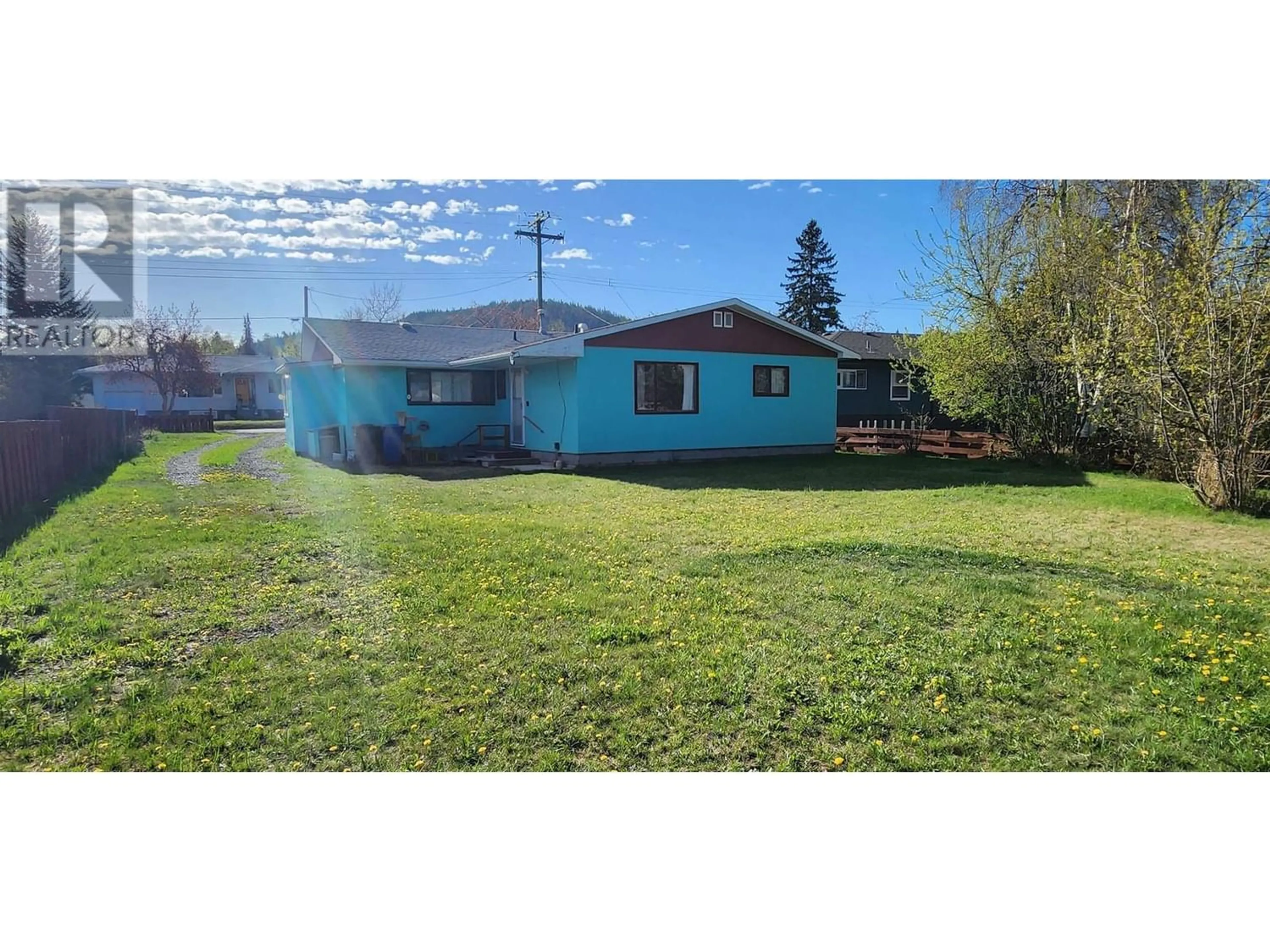 Frontside or backside of a home for 340 DOGWOOD AVENUE, 100 Mile House British Columbia V0K2E0