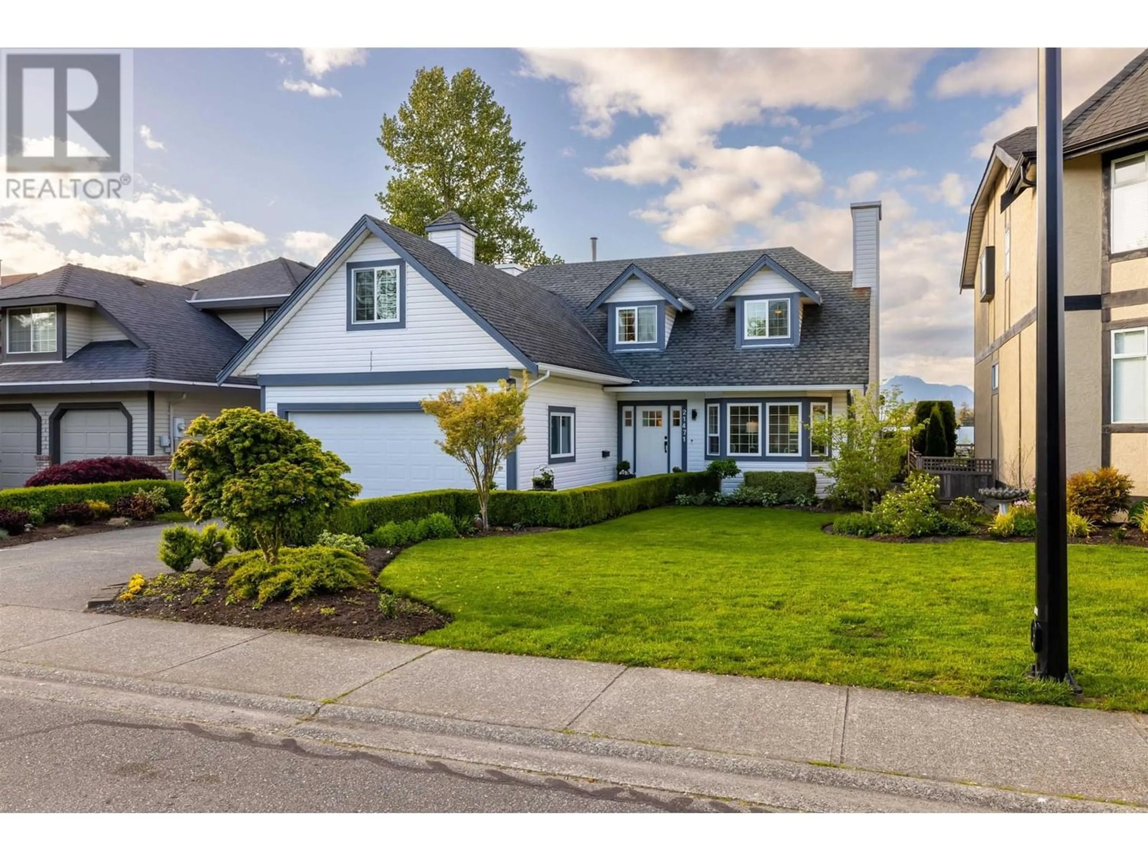 Frontside or backside of a home for 21471 THORNTON AVENUE, Maple Ridge British Columbia V4R2G6