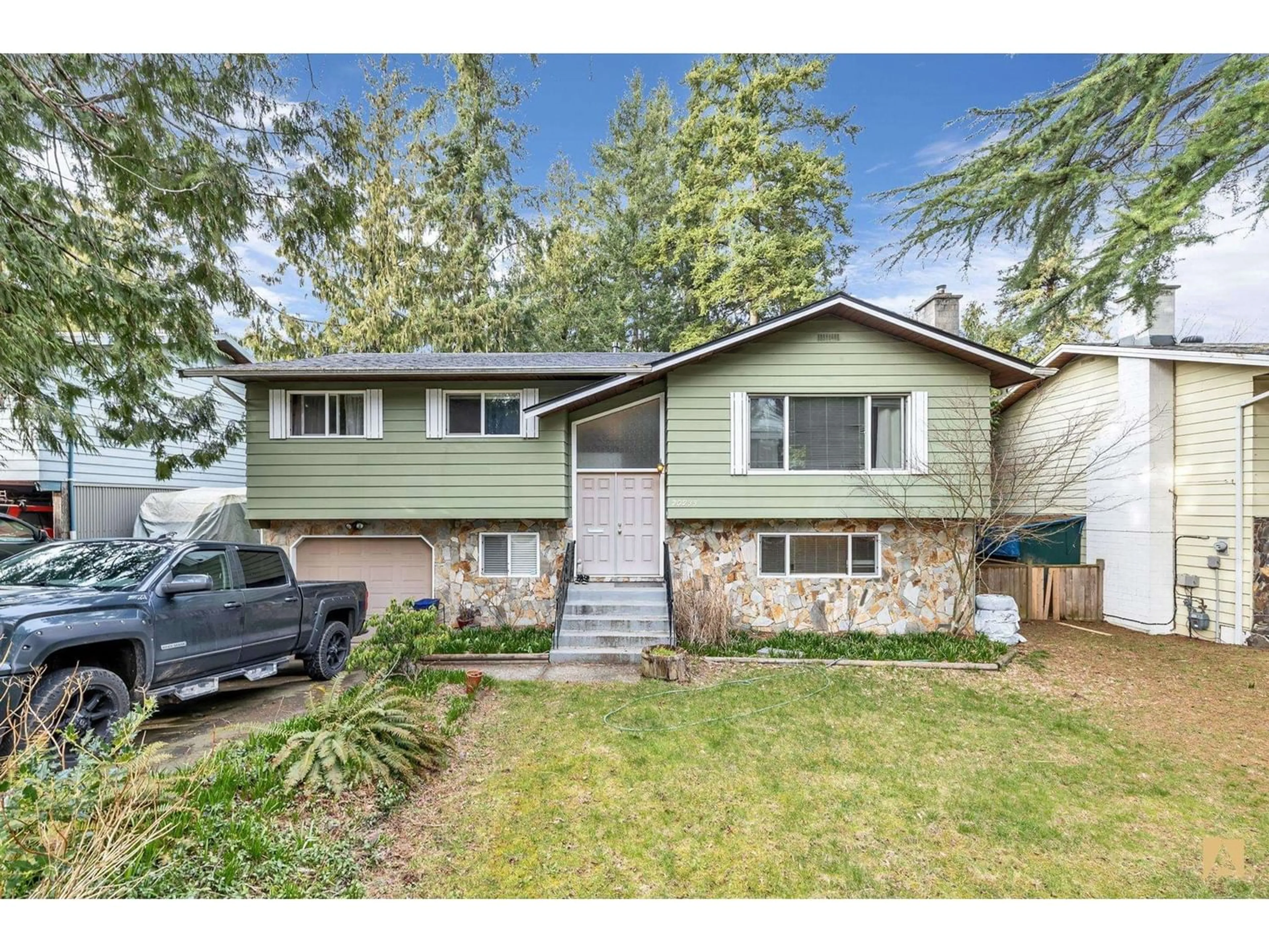 Frontside or backside of a home for 20233 44A AVENUE, Langley British Columbia V3A6N2