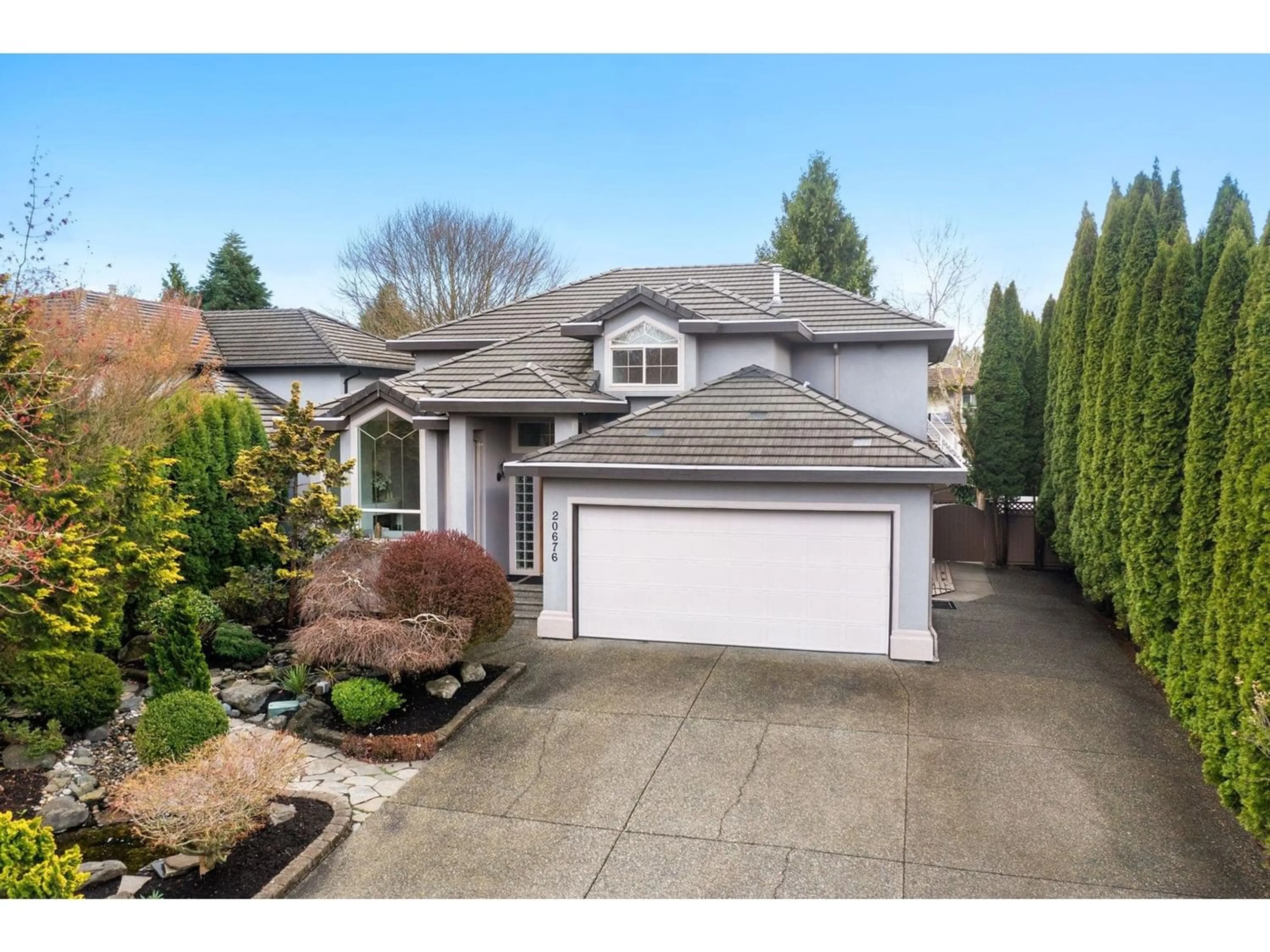 Frontside or backside of a home for 20676 91A AVENUE, Langley British Columbia V1M2X2
