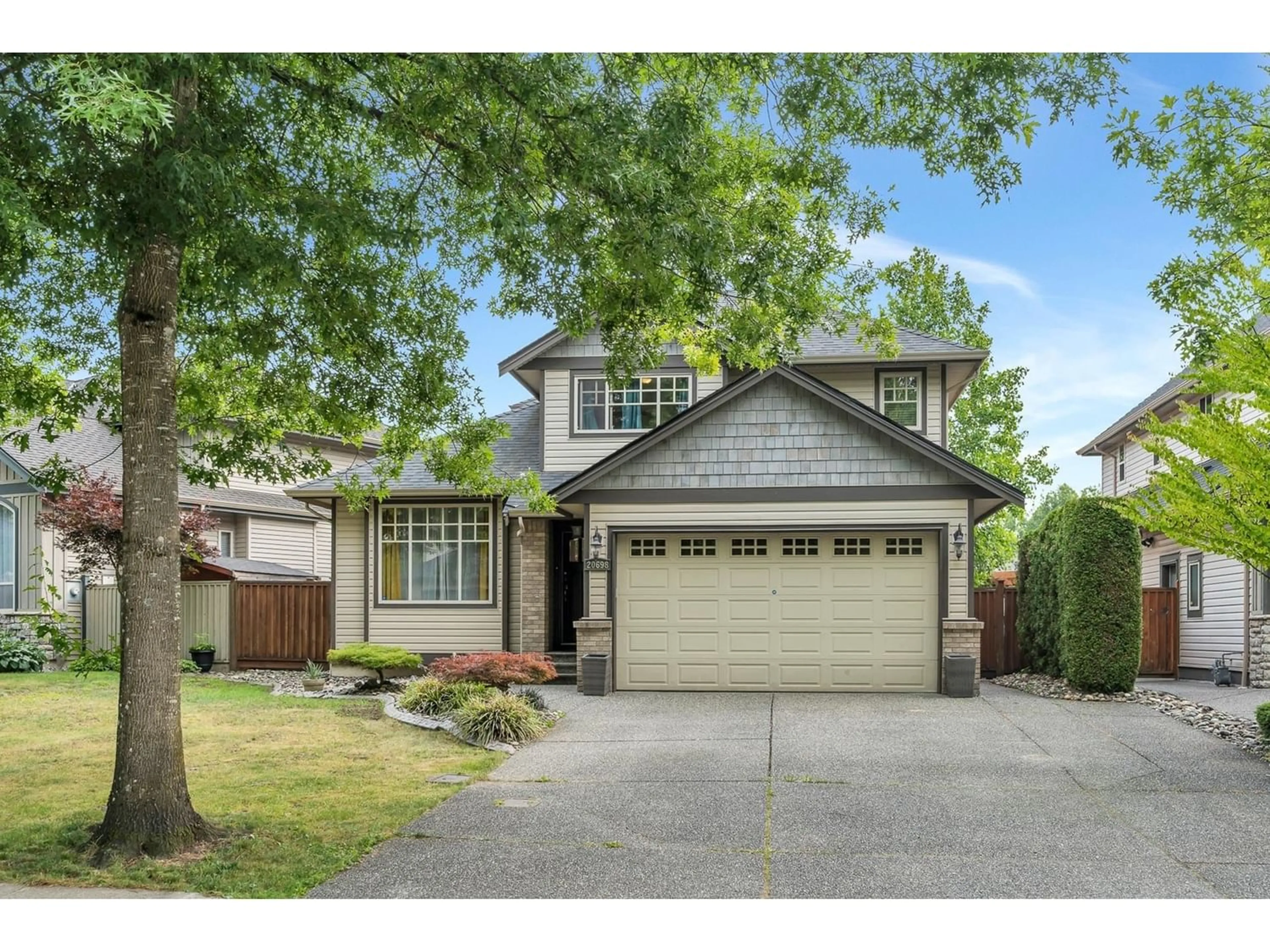 Frontside or backside of a home for 20698 97B AVENUE, Langley British Columbia V1M3Y3