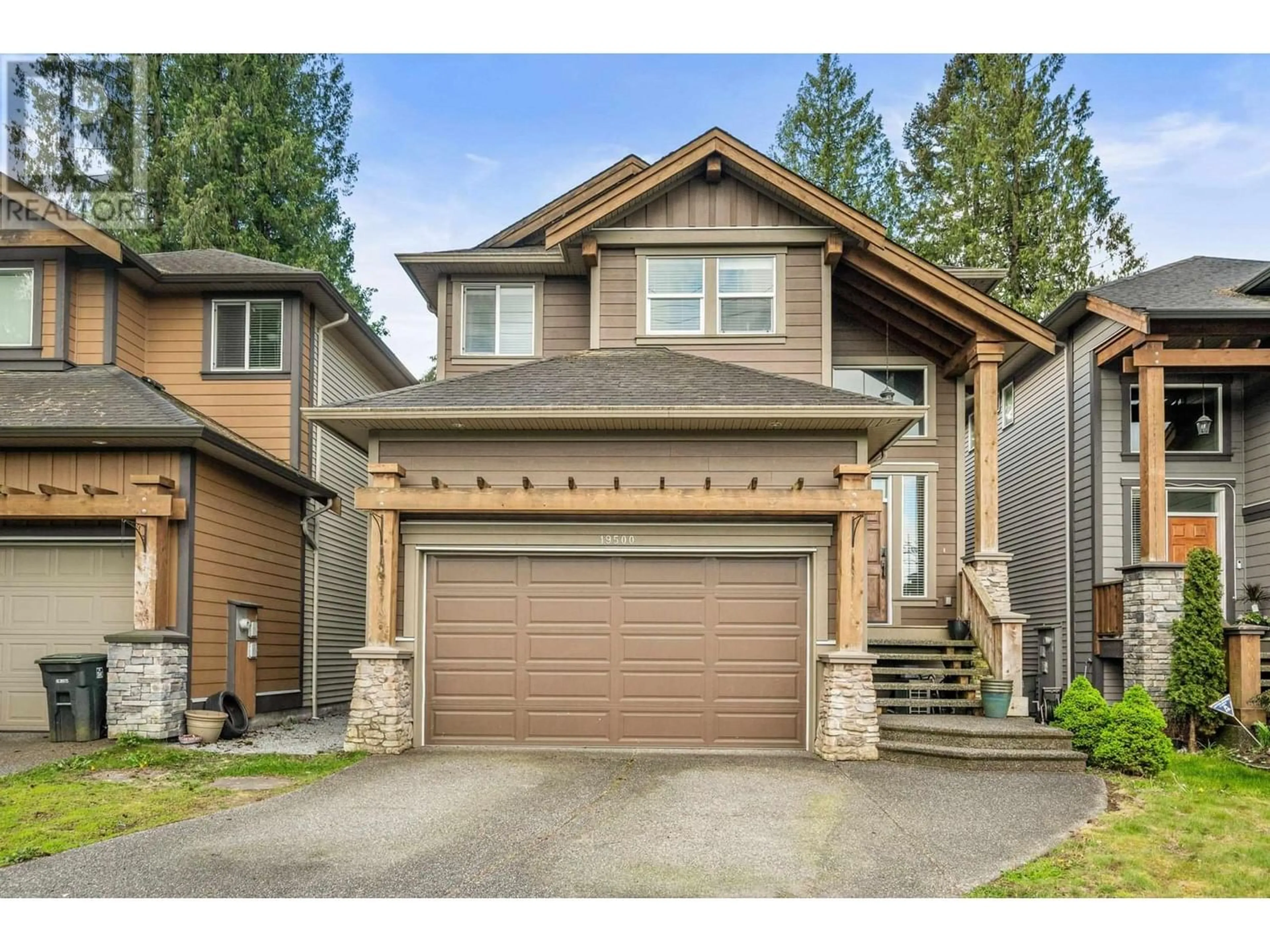 Frontside or backside of a home for 19500 HAMMOND ROAD, Pitt Meadows British Columbia V3Y1K4