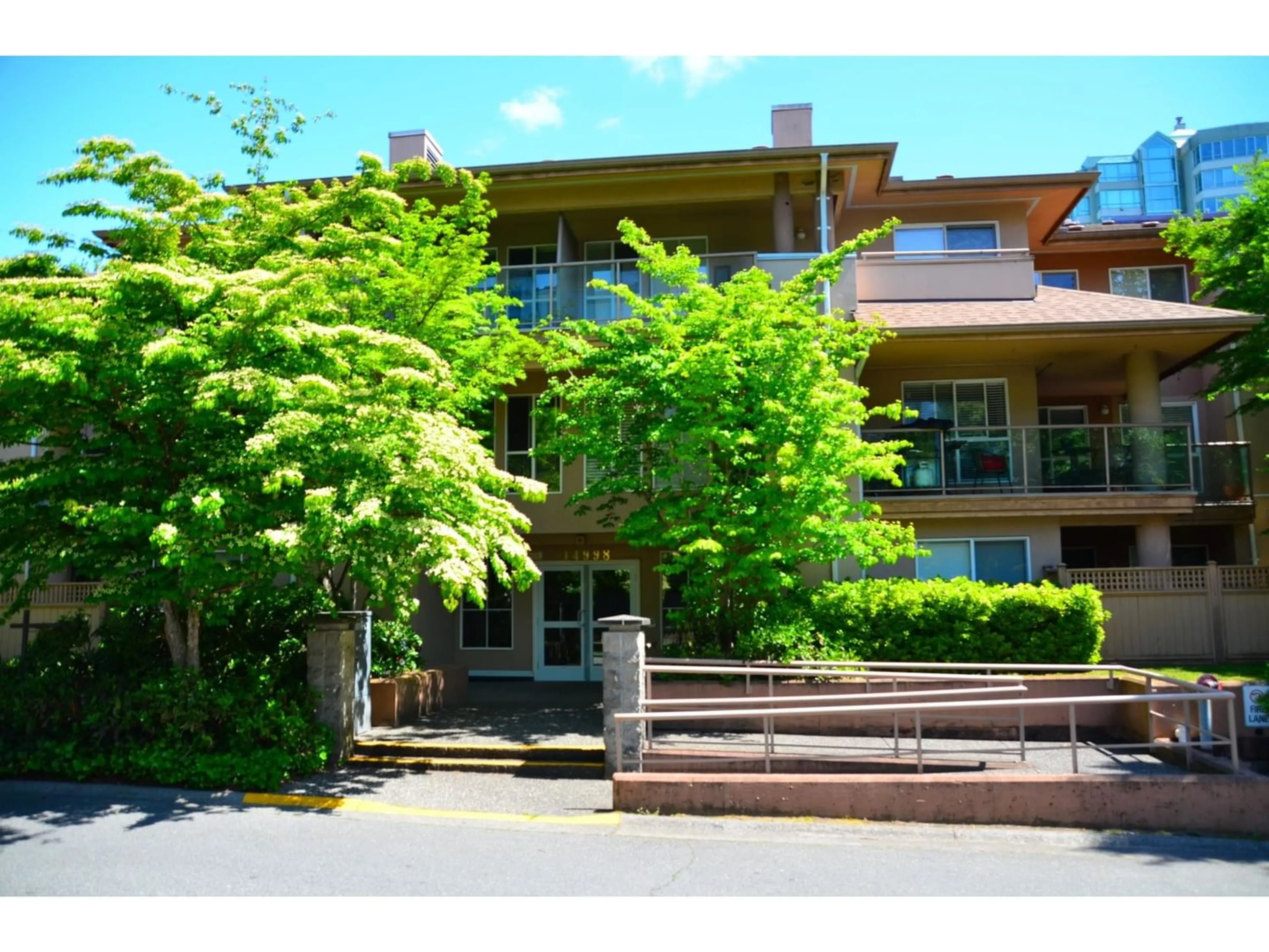 A pic from exterior of the house or condo for 307 14998 101A AVENUE, Surrey British Columbia V3R0T1