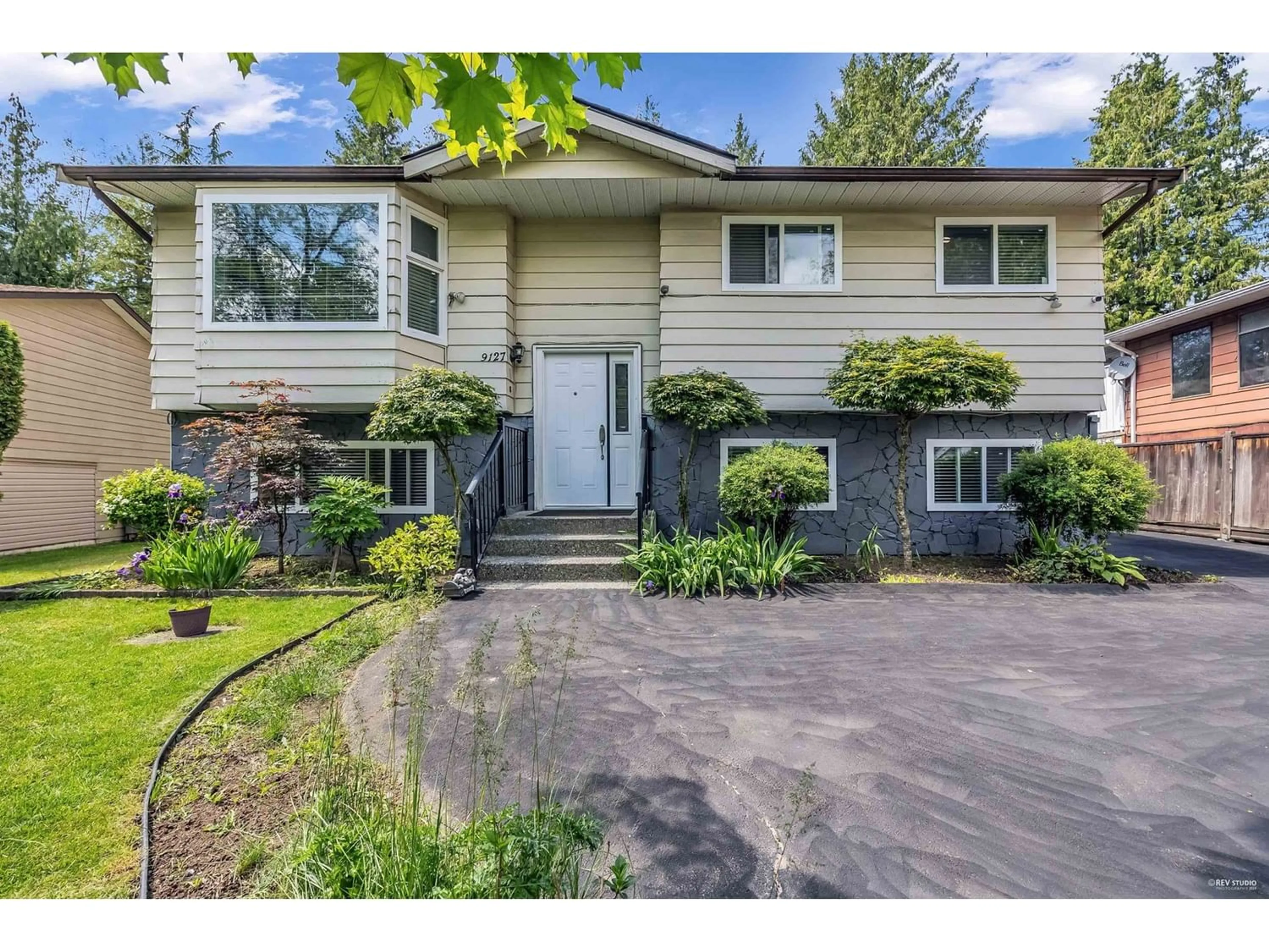 Frontside or backside of a home for 9127 146A STREET, Surrey British Columbia V3R6Z6