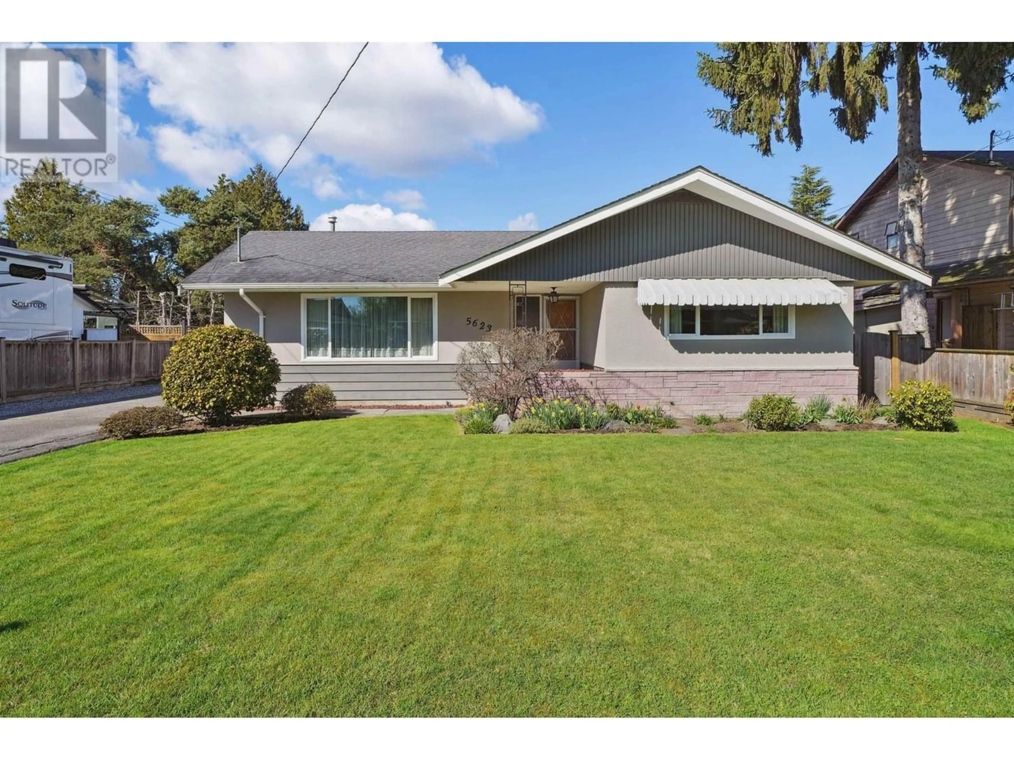 Frontside or backside of a home for 5623 GROVE AVENUE, Delta British Columbia V4K2A6