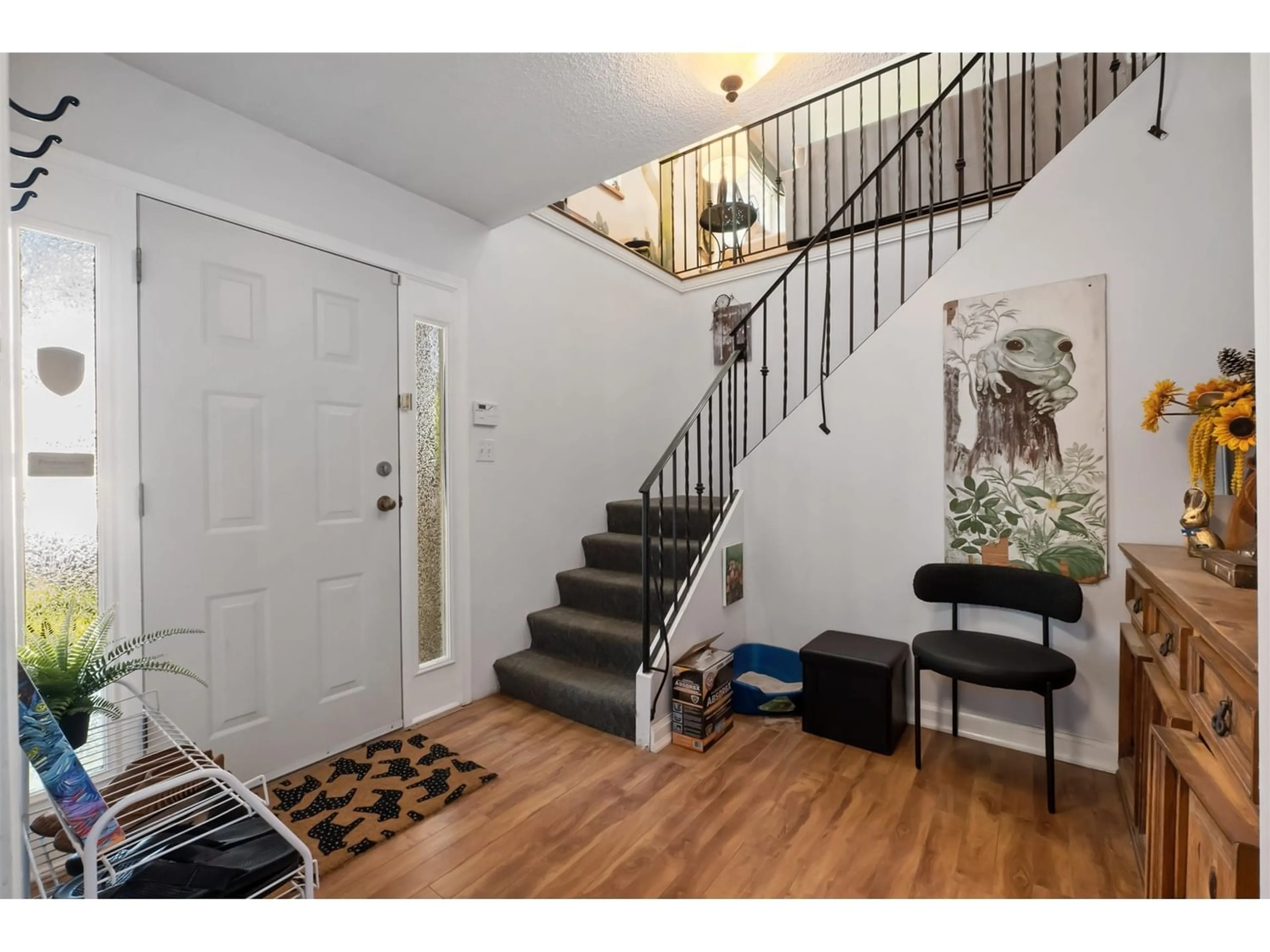 Indoor entryway, wood floors for 20784 48 AVENUE, Langley British Columbia V3A3L8