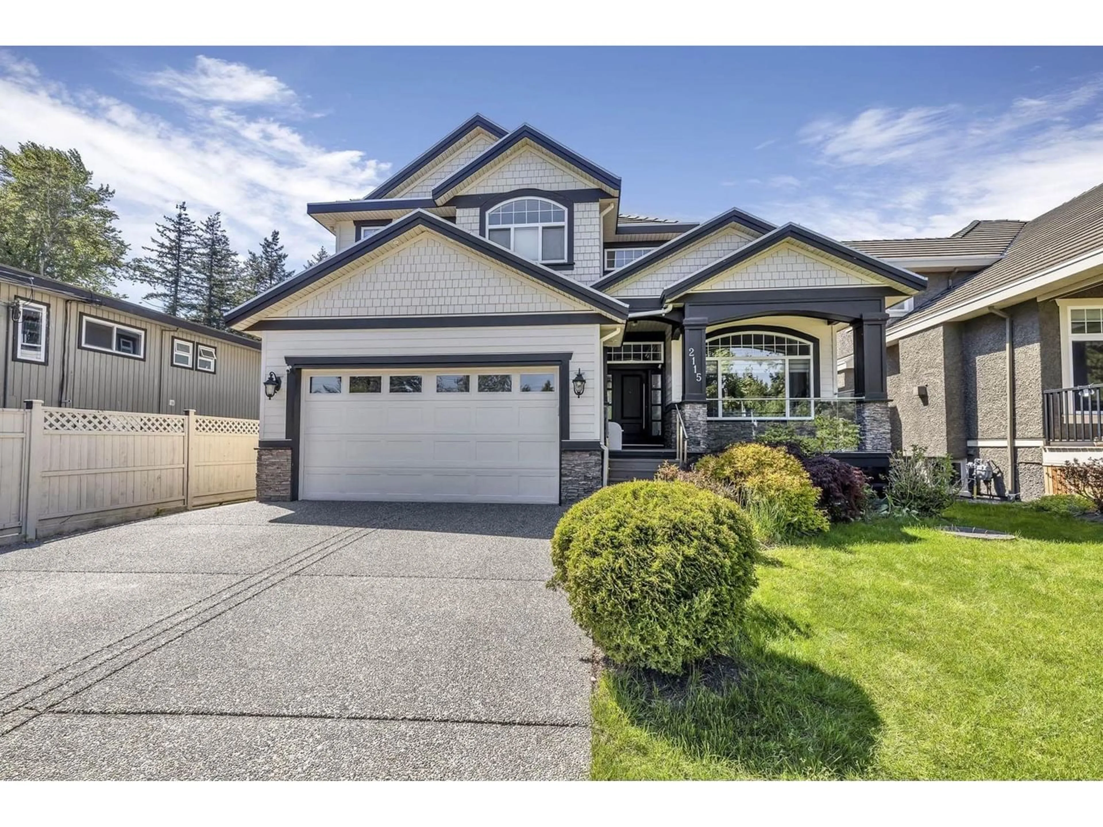 Frontside or backside of a home for 2115 156 STREET, Surrey British Columbia V4A4T9