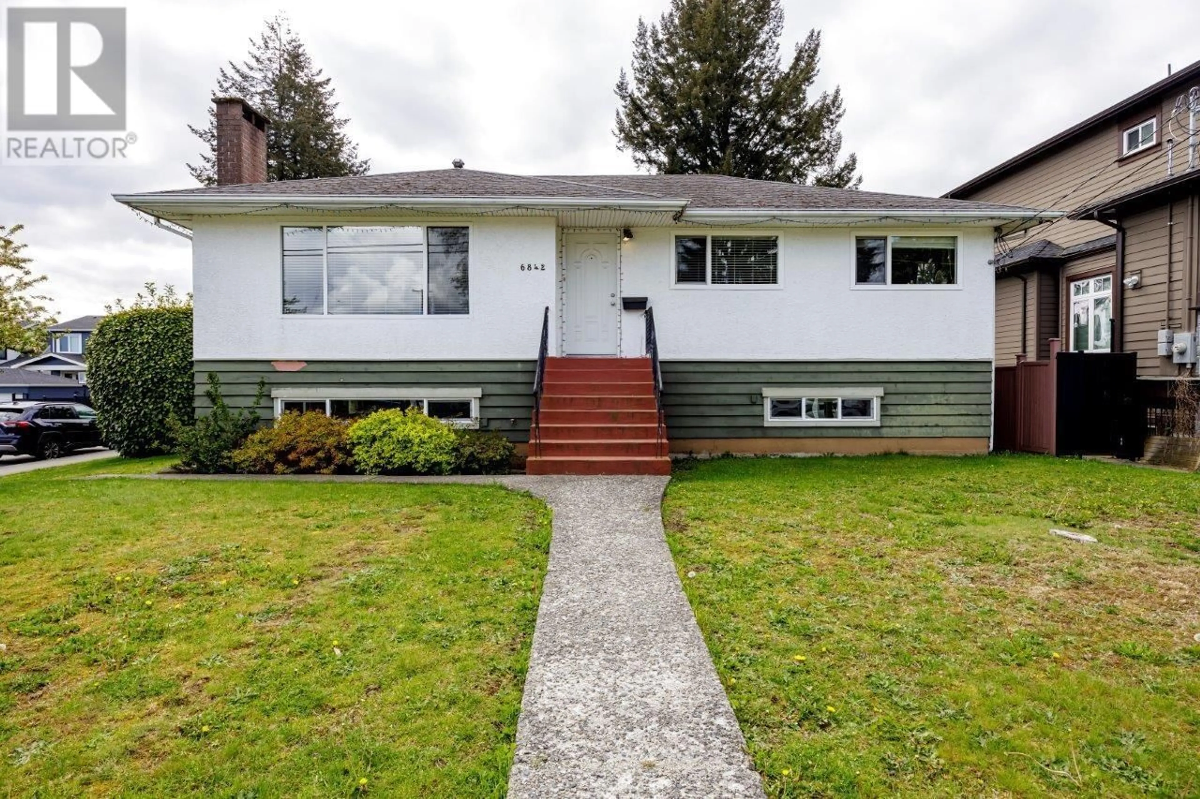 Frontside or backside of a home for 6842 UNION STREET, Burnaby British Columbia V5B1X4