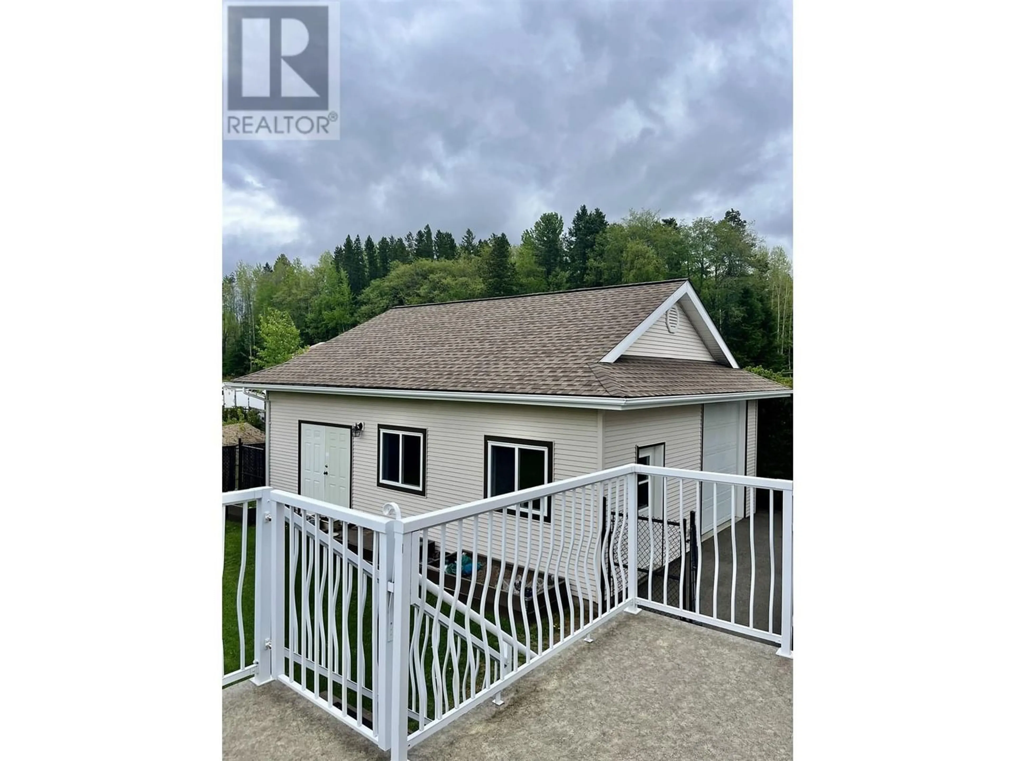 Frontside or backside of a home for 4934 TWEDLE AVENUE, Terrace British Columbia V8G4G7