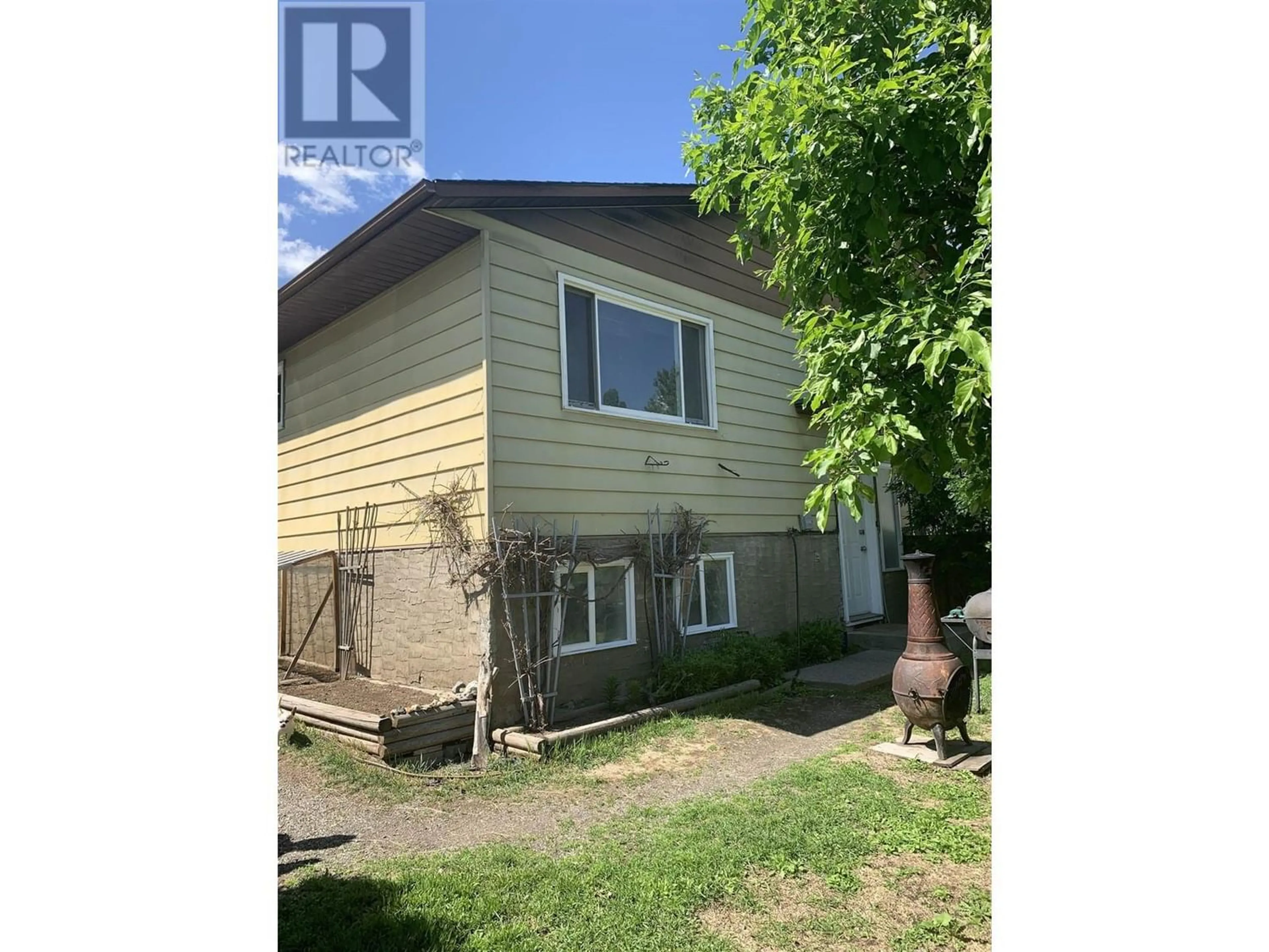 Frontside or backside of a home for A 311 BETTCHER STREET, Quesnel British Columbia V2J5G4
