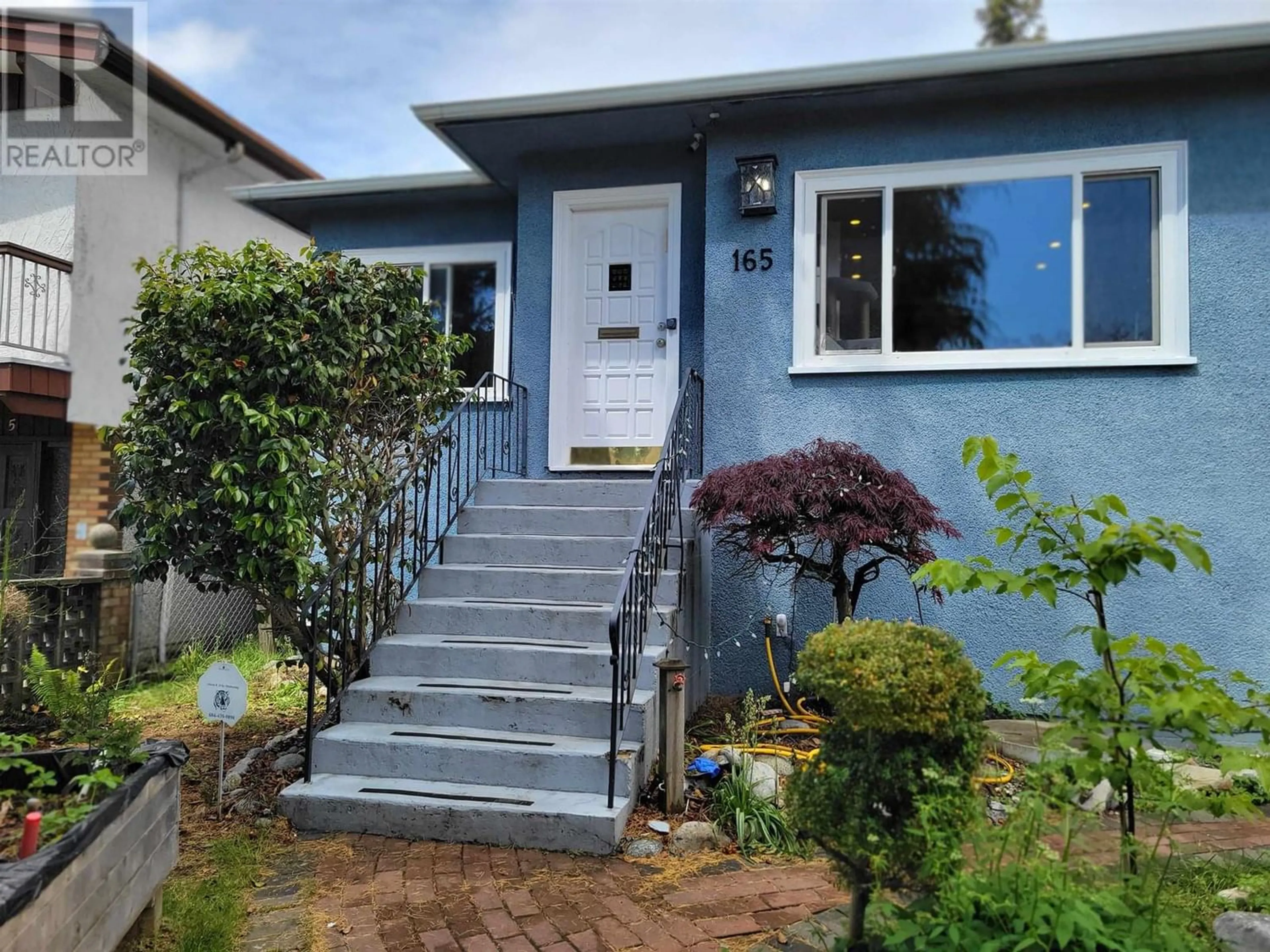 Frontside or backside of a home for 165 E 55TH AVENUE, Vancouver British Columbia V5X1M7