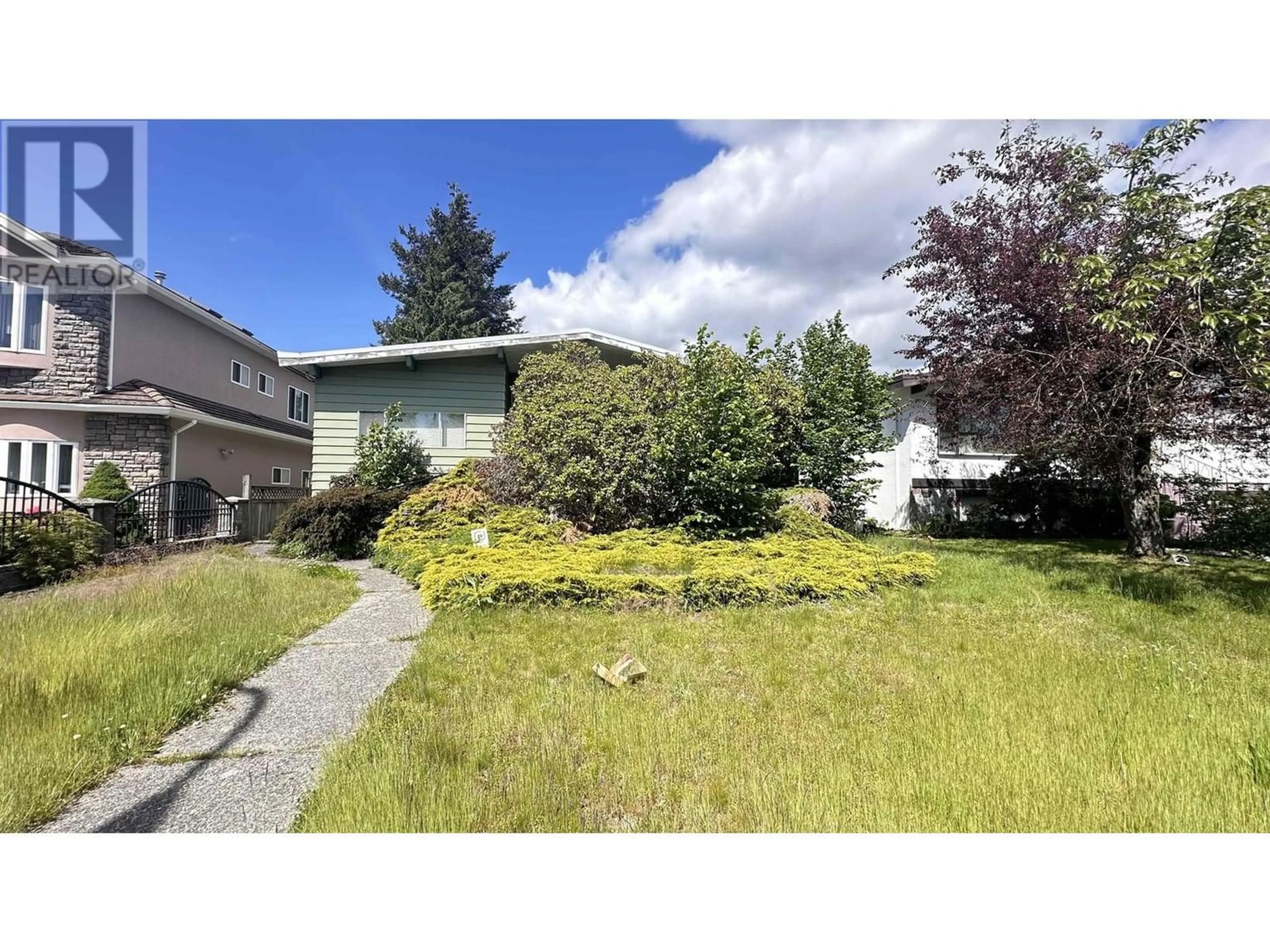 Frontside or backside of a home for 2235 E 49TH AVENUE, Vancouver British Columbia V5P1T9