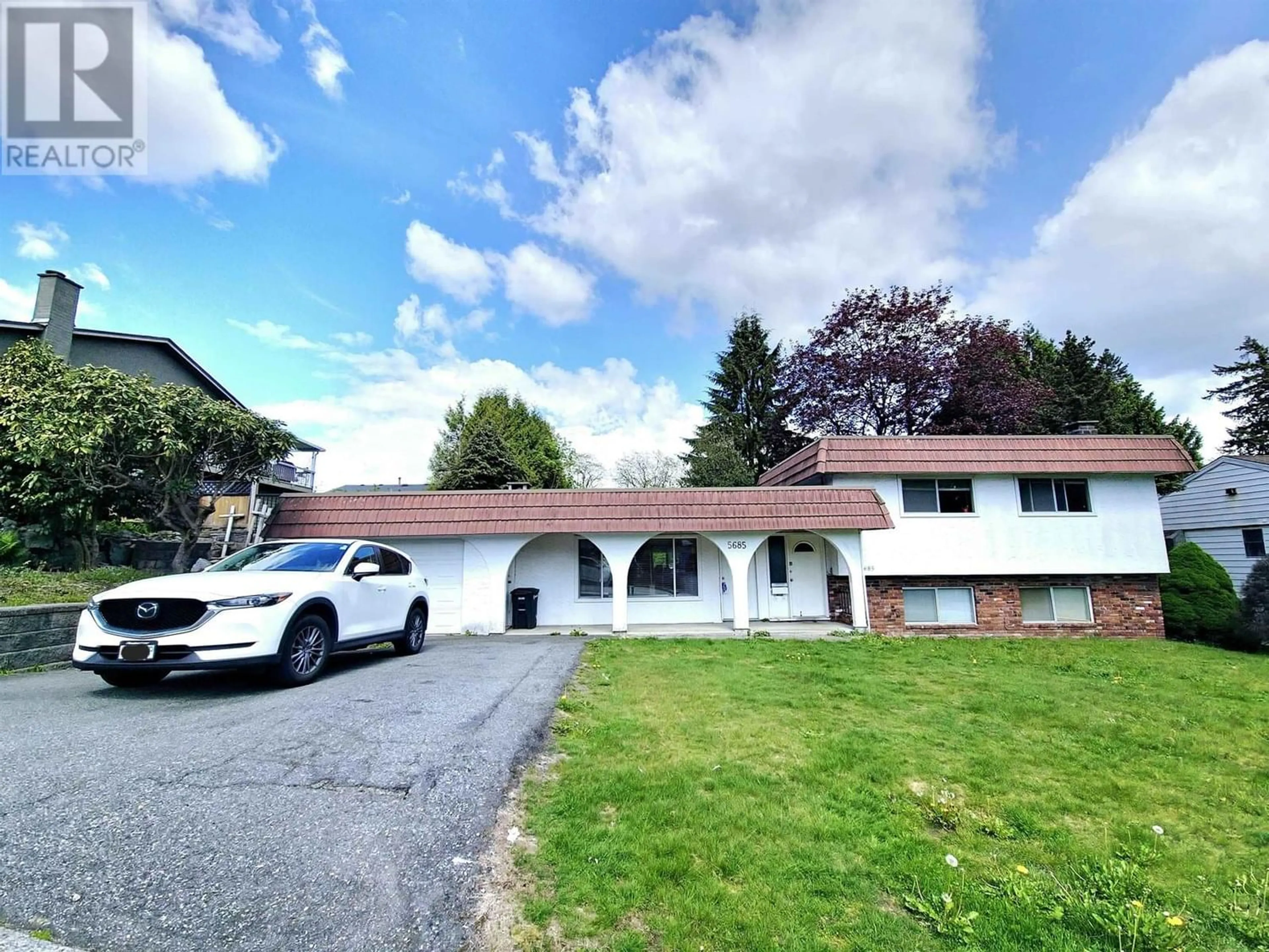 Frontside or backside of a home for 5685 FOREST STREET, Burnaby British Columbia V5G1X5