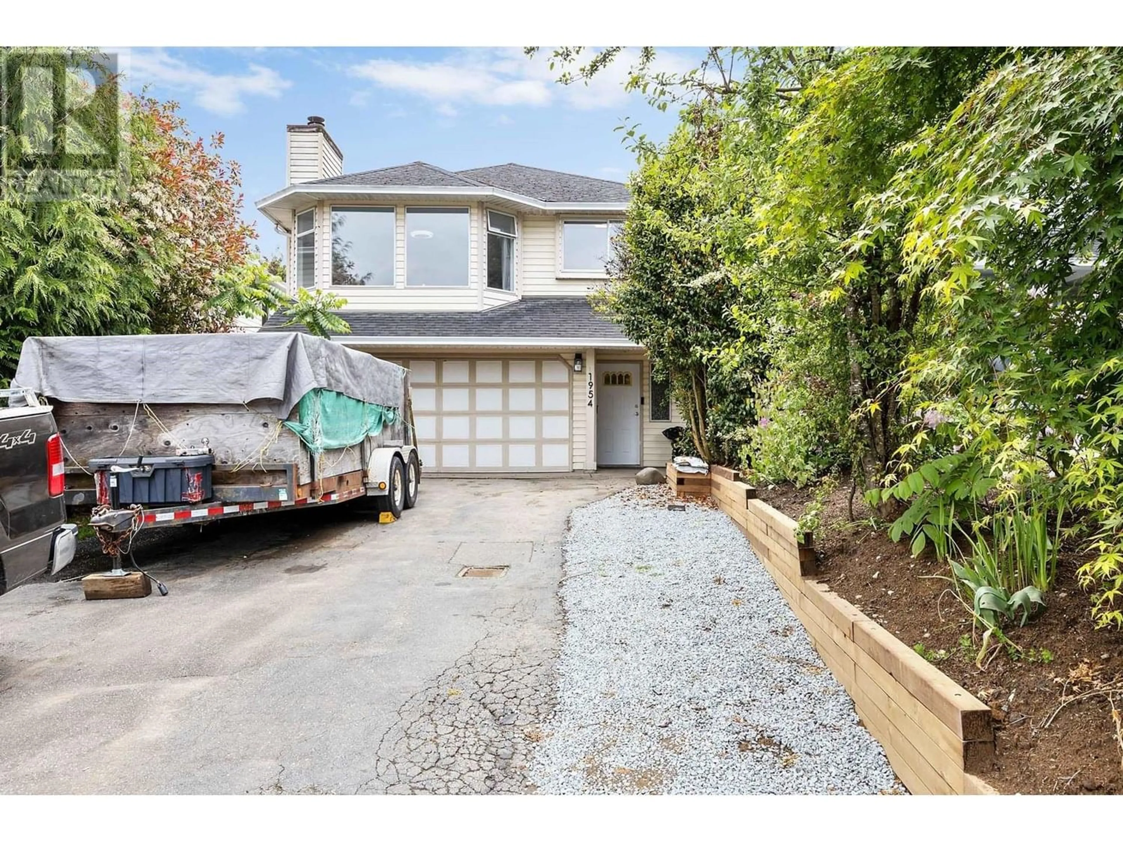 Frontside or backside of a home for 1954 LANGAN AVENUE, Port Coquitlam British Columbia V3C1K9