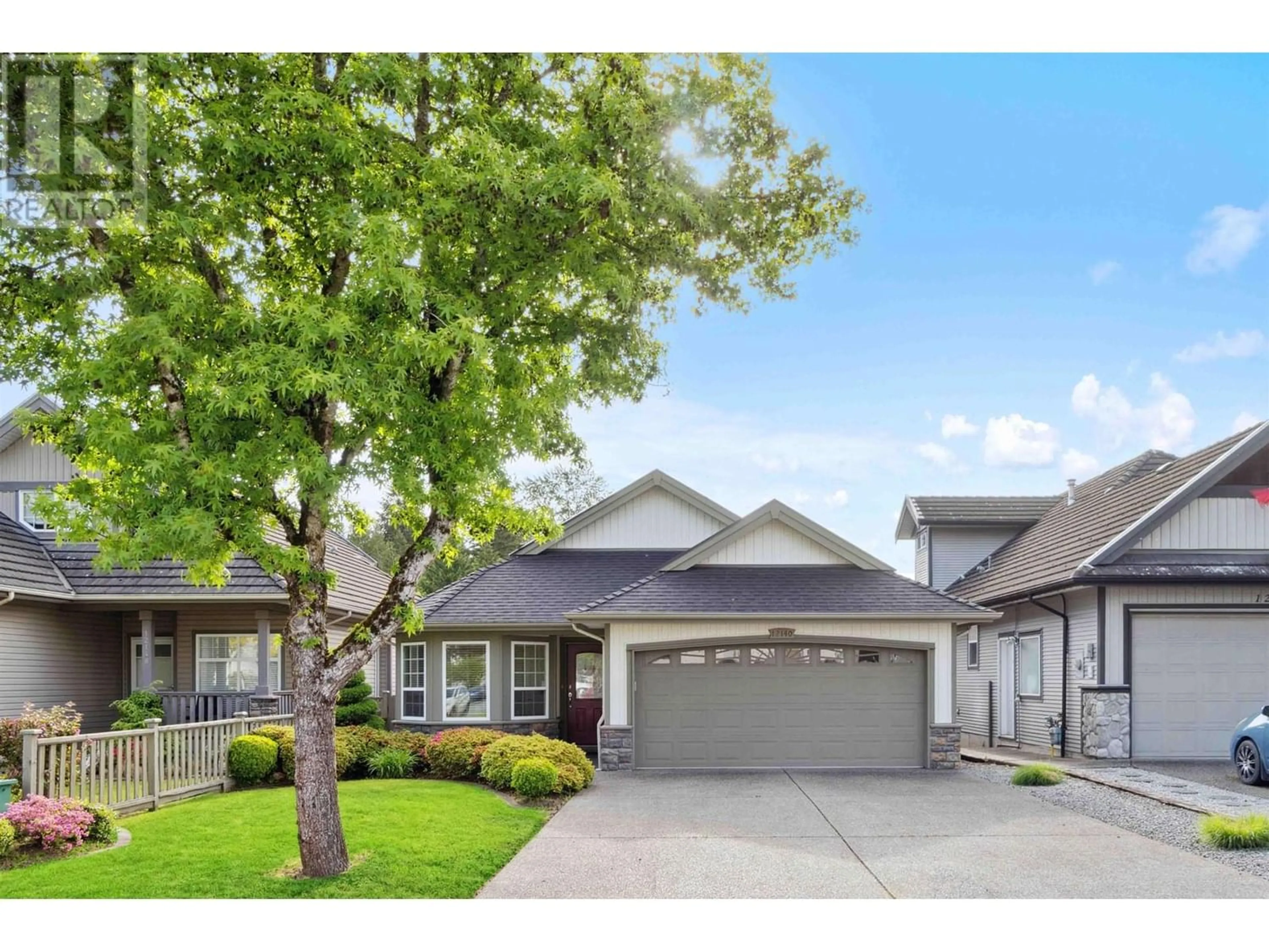 Frontside or backside of a home for 12140 BLOSSOM STREET, Maple Ridge British Columbia V2X1C3