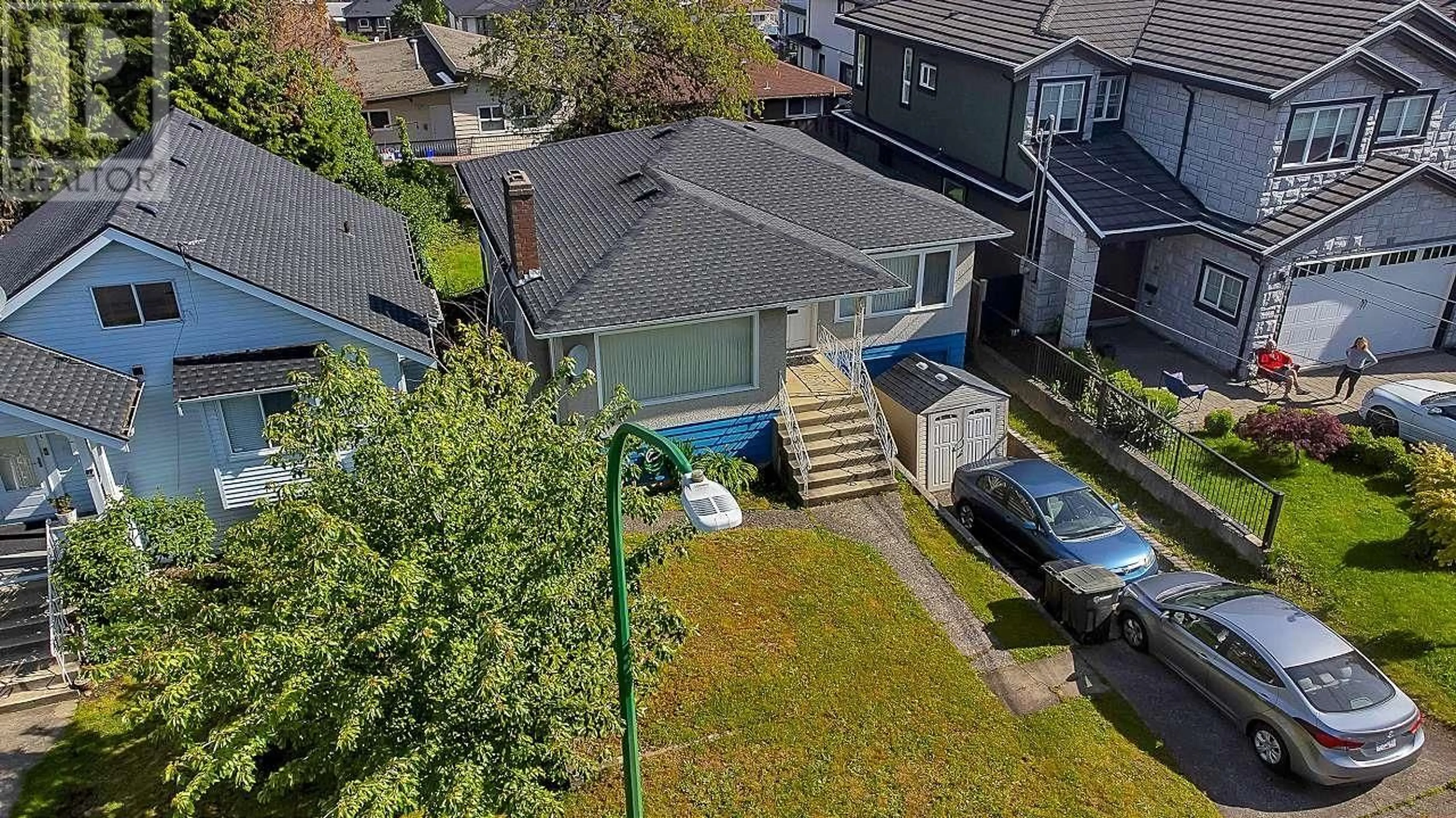 Frontside or backside of a home, the fenced backyard for 3723 PRICE STREET, Burnaby British Columbia V5G2K9