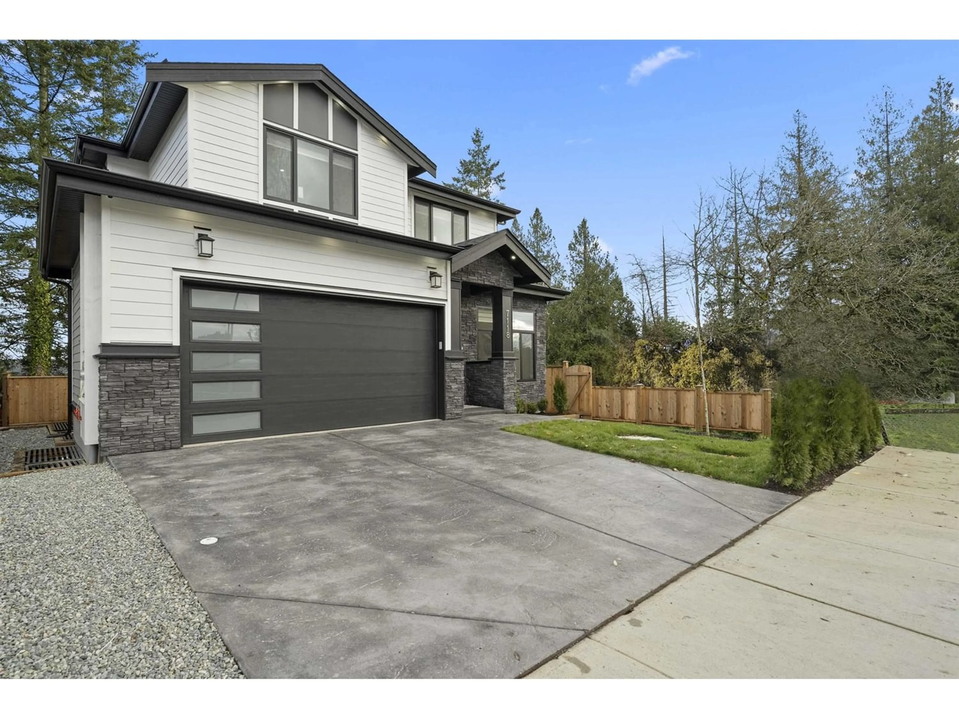 Frontside or backside of a home for 7118 204A STREET, Langley British Columbia V2Y3S7