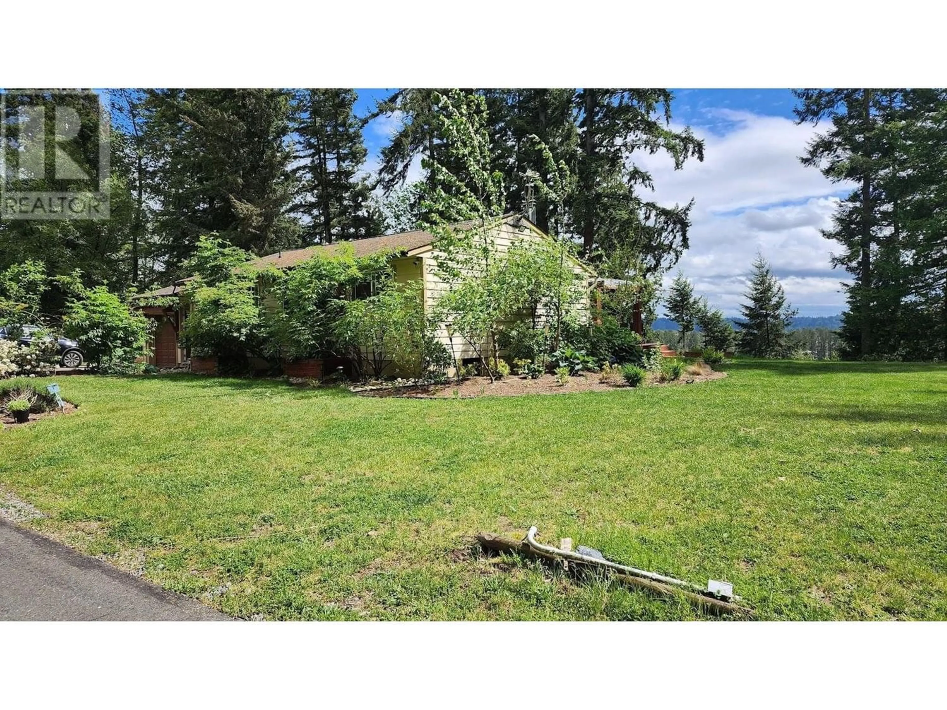 Frontside or backside of a home, the fenced backyard for 26521 LOUGHEED HIGHWAY, Maple Ridge British Columbia V2W1K2