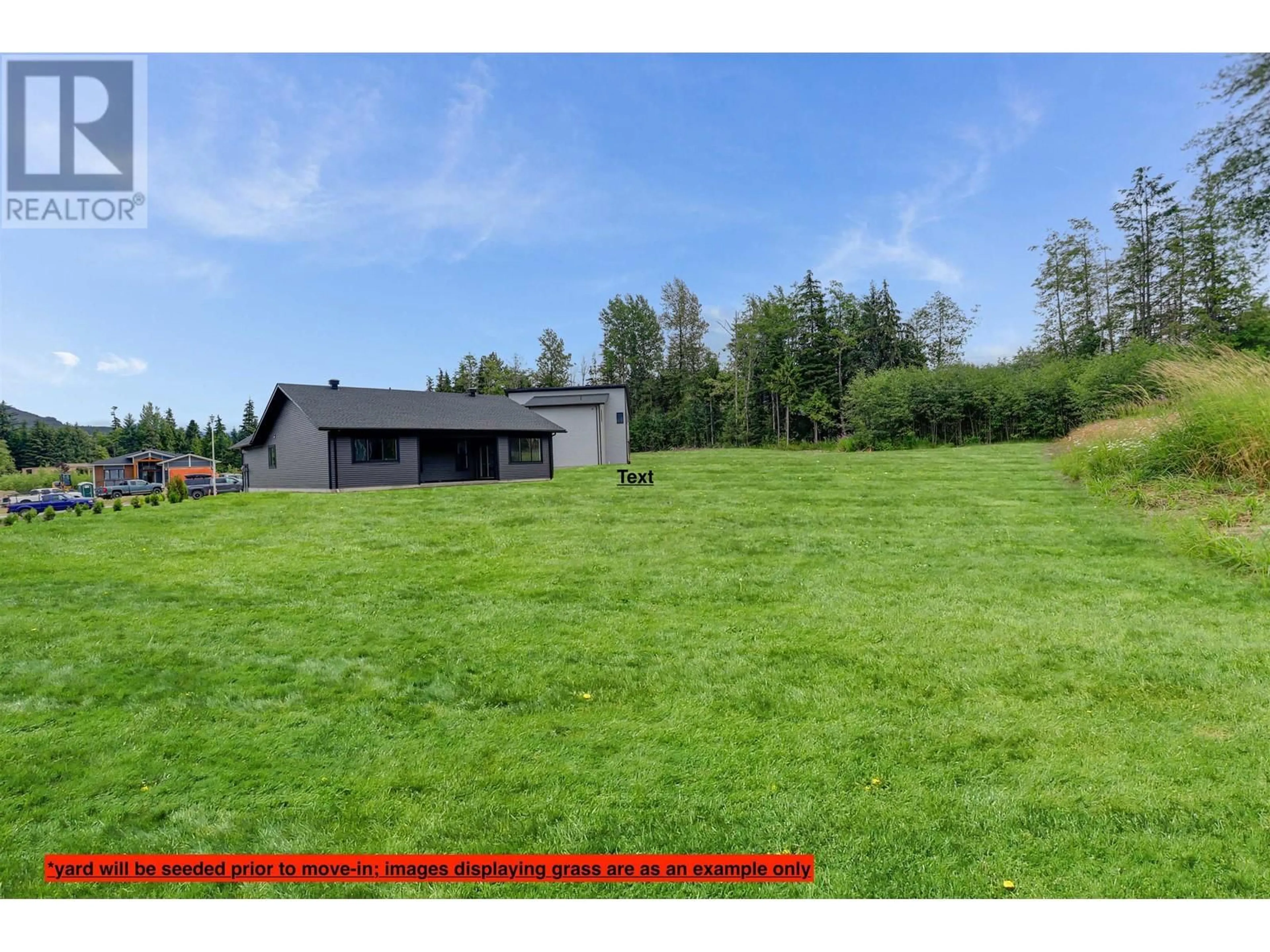 Frontside or backside of a home, the fenced backyard for 5 WILSON STREET, Kitimat British Columbia V8C2S2