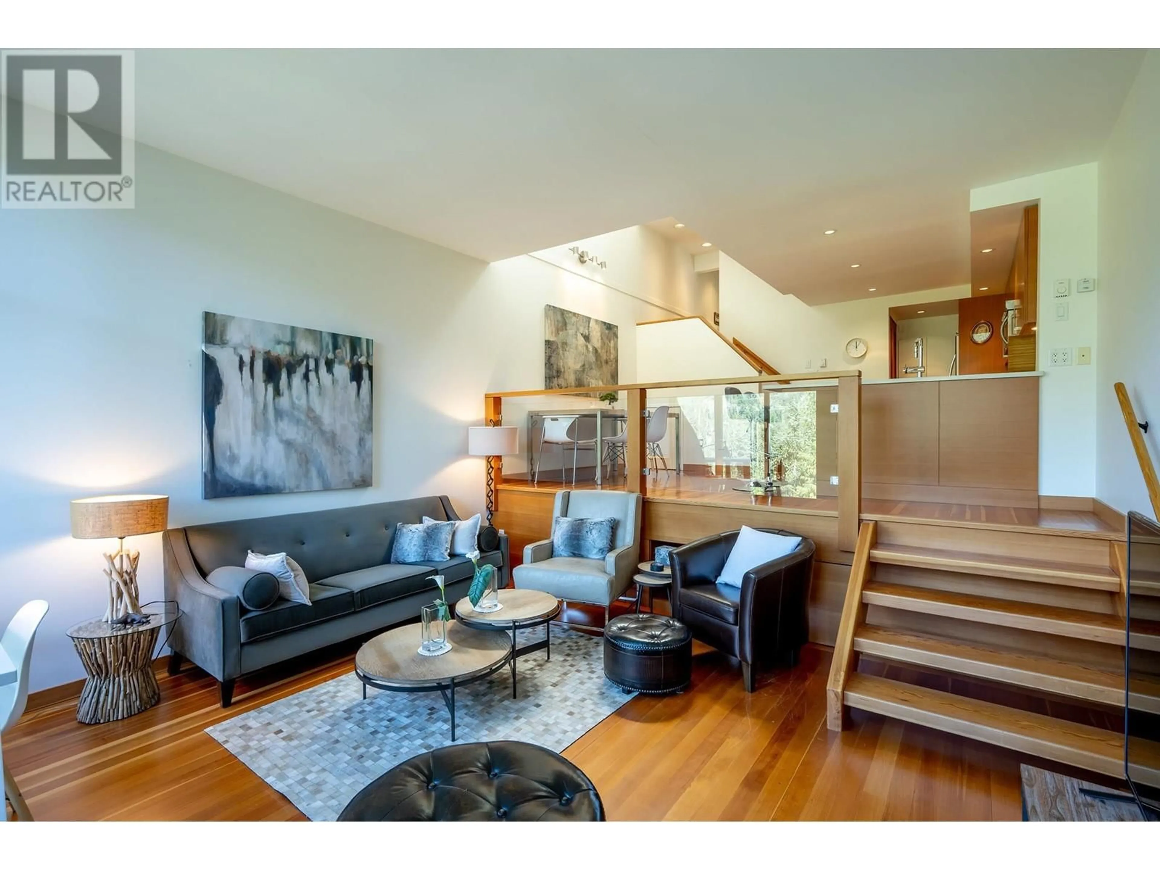 Living room with furniture, wood/laminate floor for 6 - 2221 GONDOLA WAY, Whistler British Columbia V8E0M8