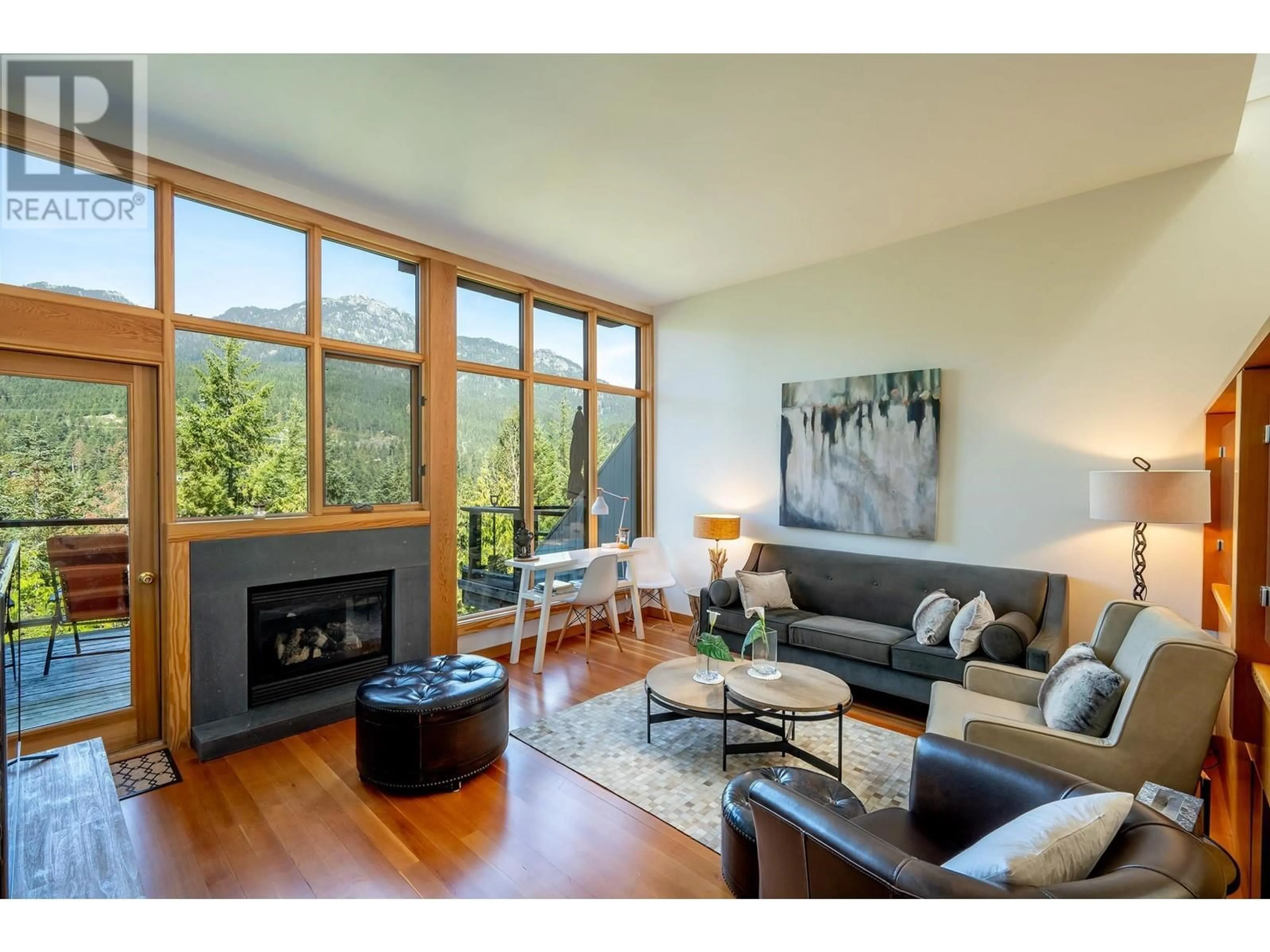Living room with furniture, wood/laminate floor for 6 - 2221 GONDOLA WAY, Whistler British Columbia V8E0M8