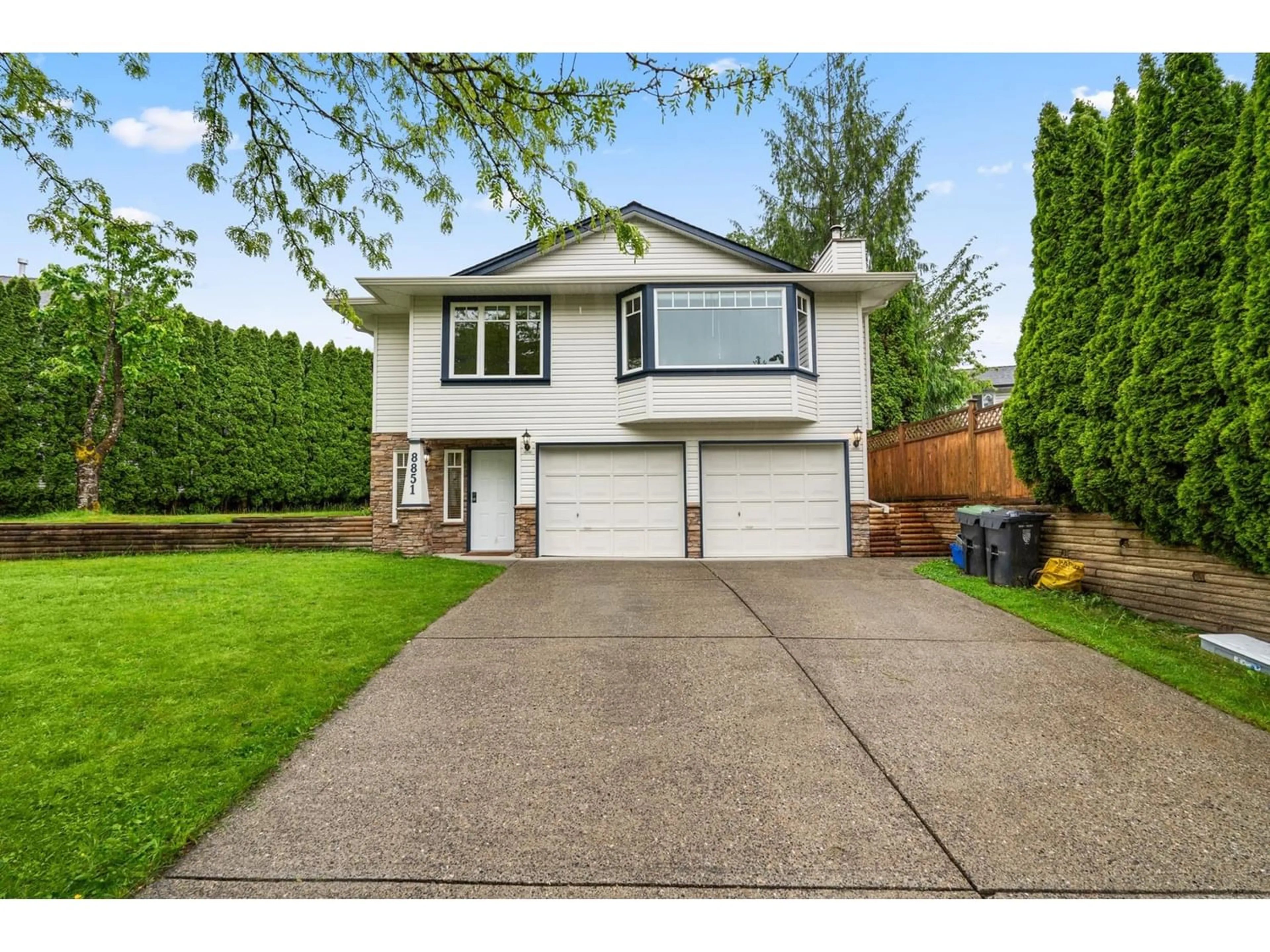 Frontside or backside of a home for 8851 214B STREET, Langley British Columbia V1M1Y4