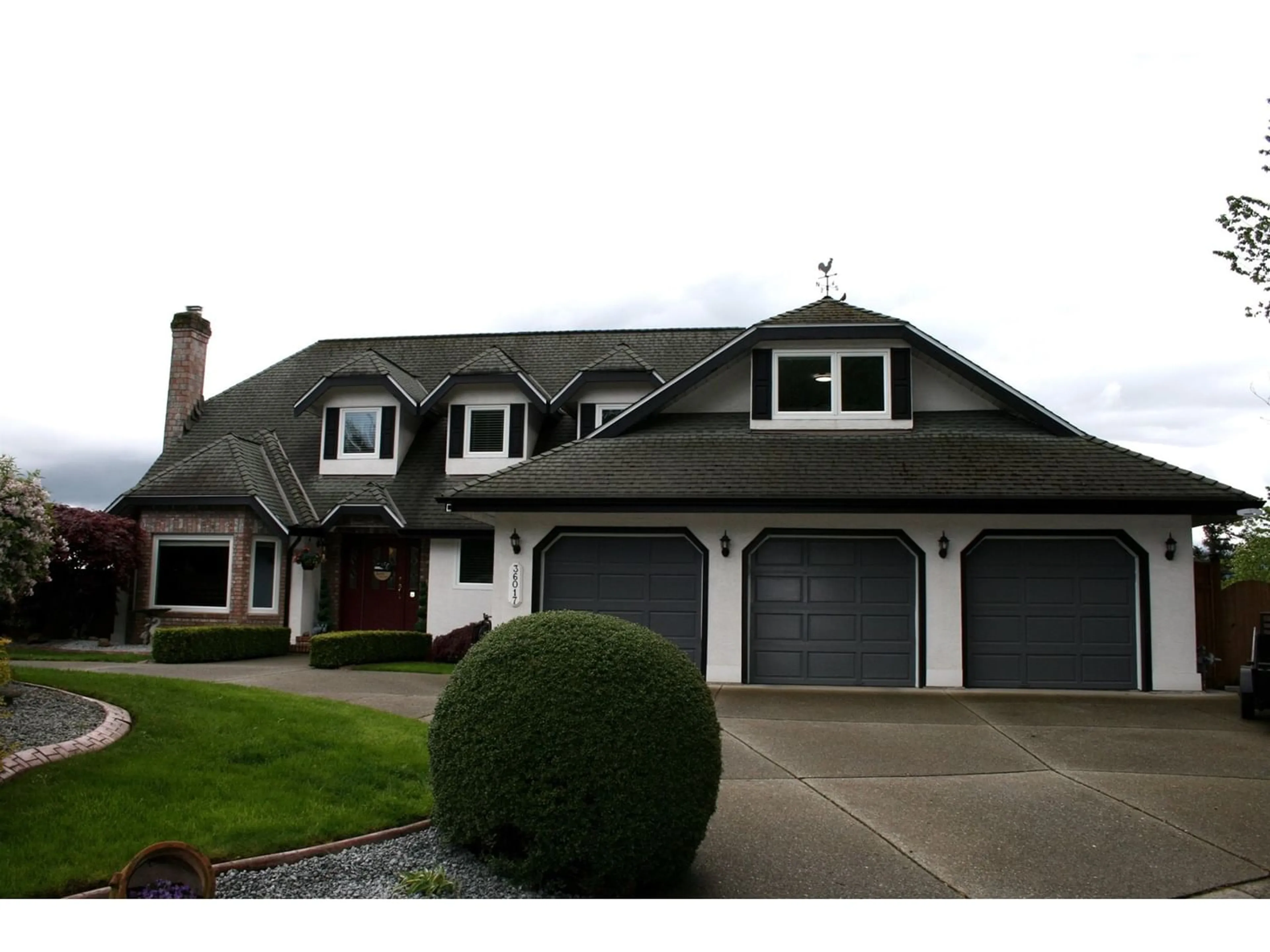 Frontside or backside of a home for 36017 SUNDEW PLACE, Abbotsford British Columbia V3G1E9