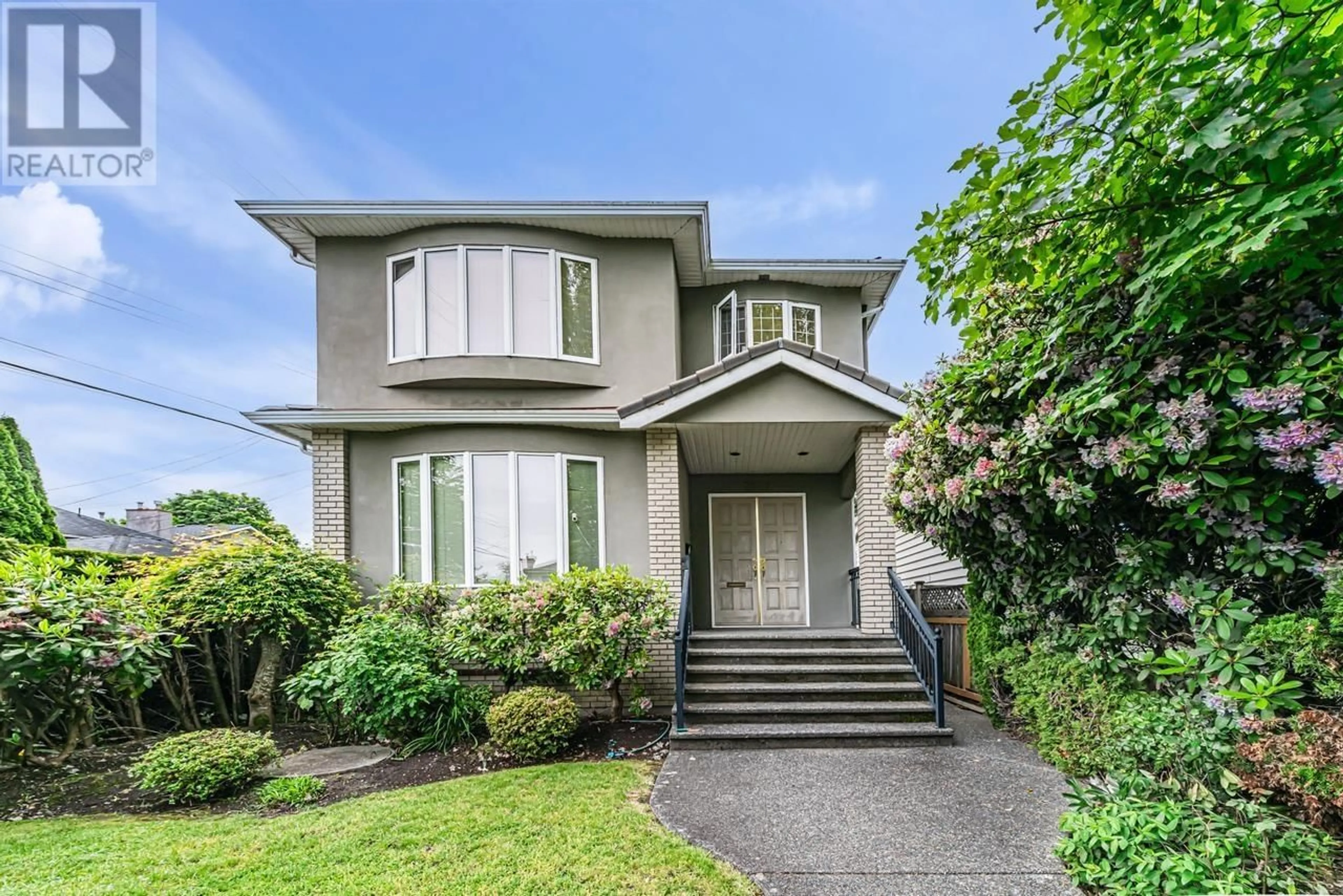 Frontside or backside of a home for 7977 MONTCALM STREET, Vancouver British Columbia V6P4P2