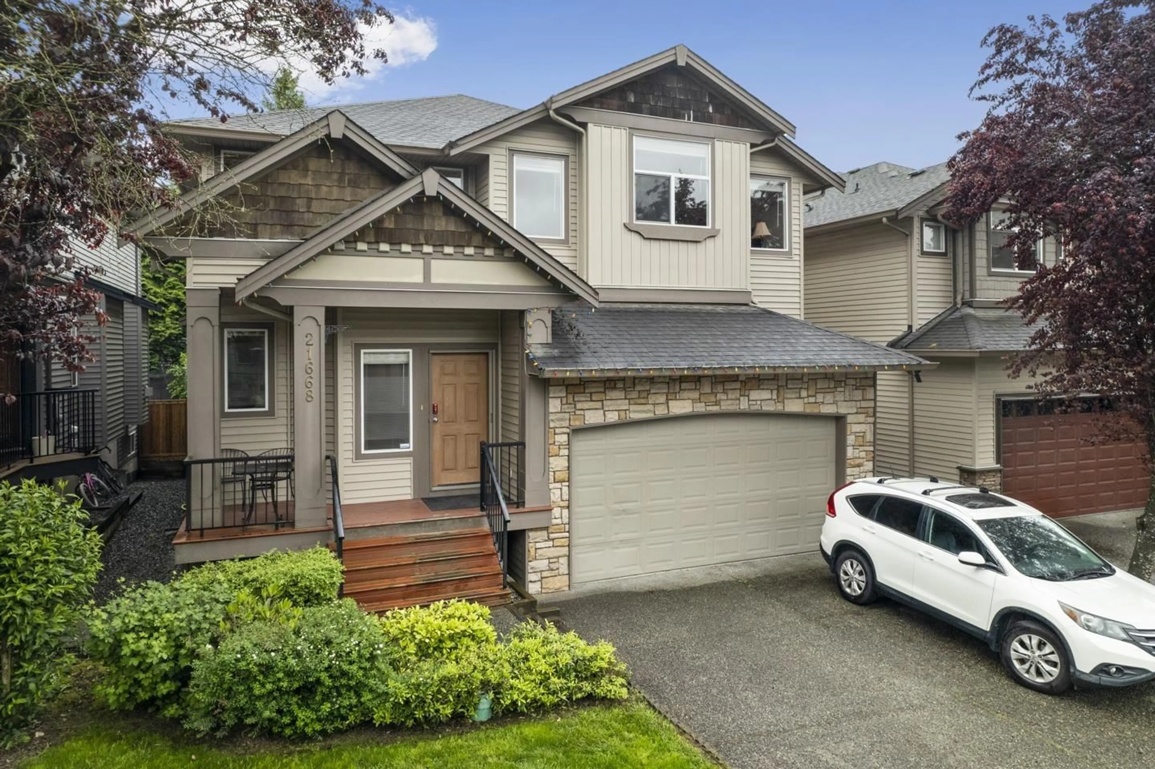 Frontside or backside of a home for 21668 89A AVENUE, Langley British Columbia V1M4C6