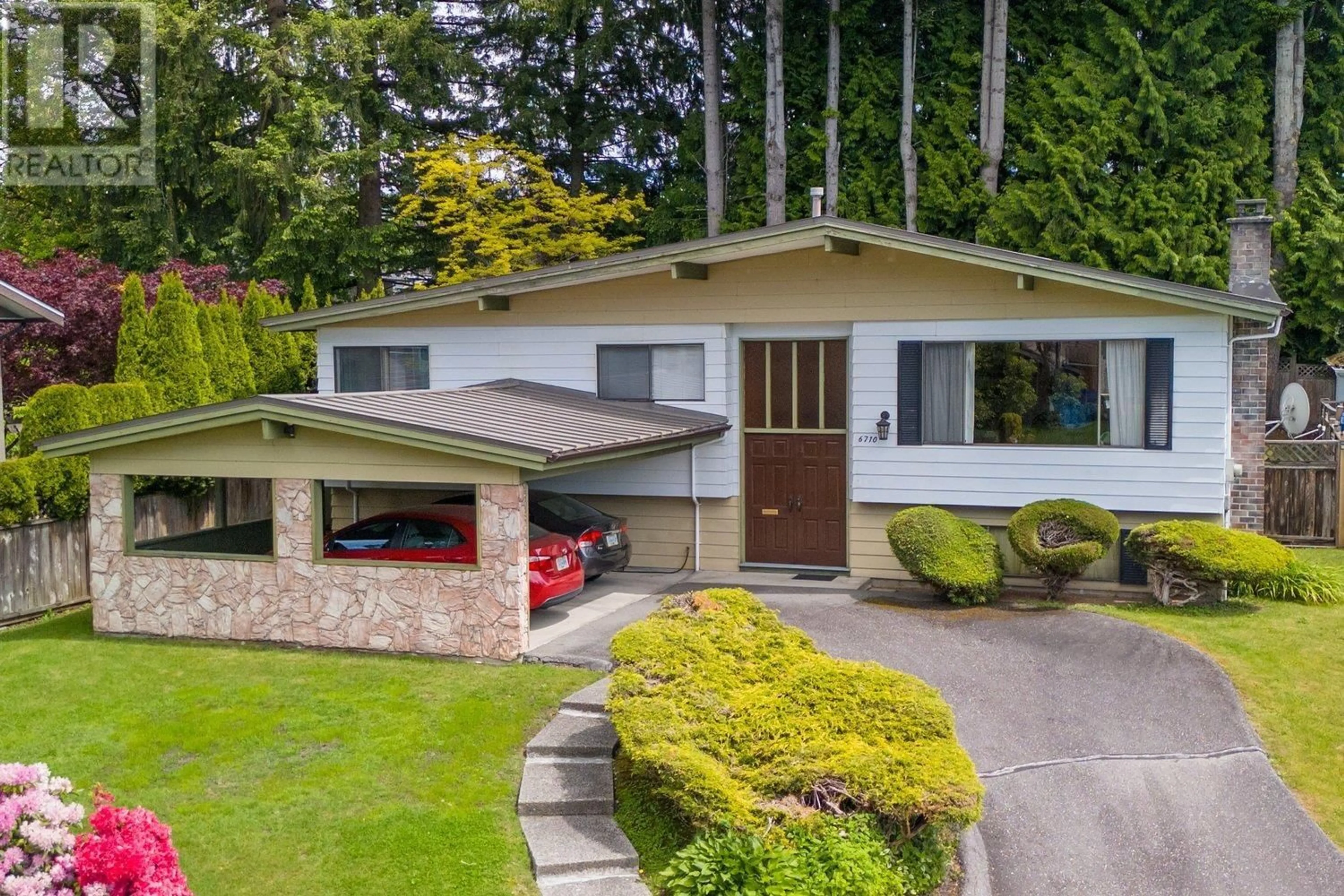 Frontside or backside of a home for 6710 WOODVALE CRESCENT, Burnaby British Columbia V5B2R6