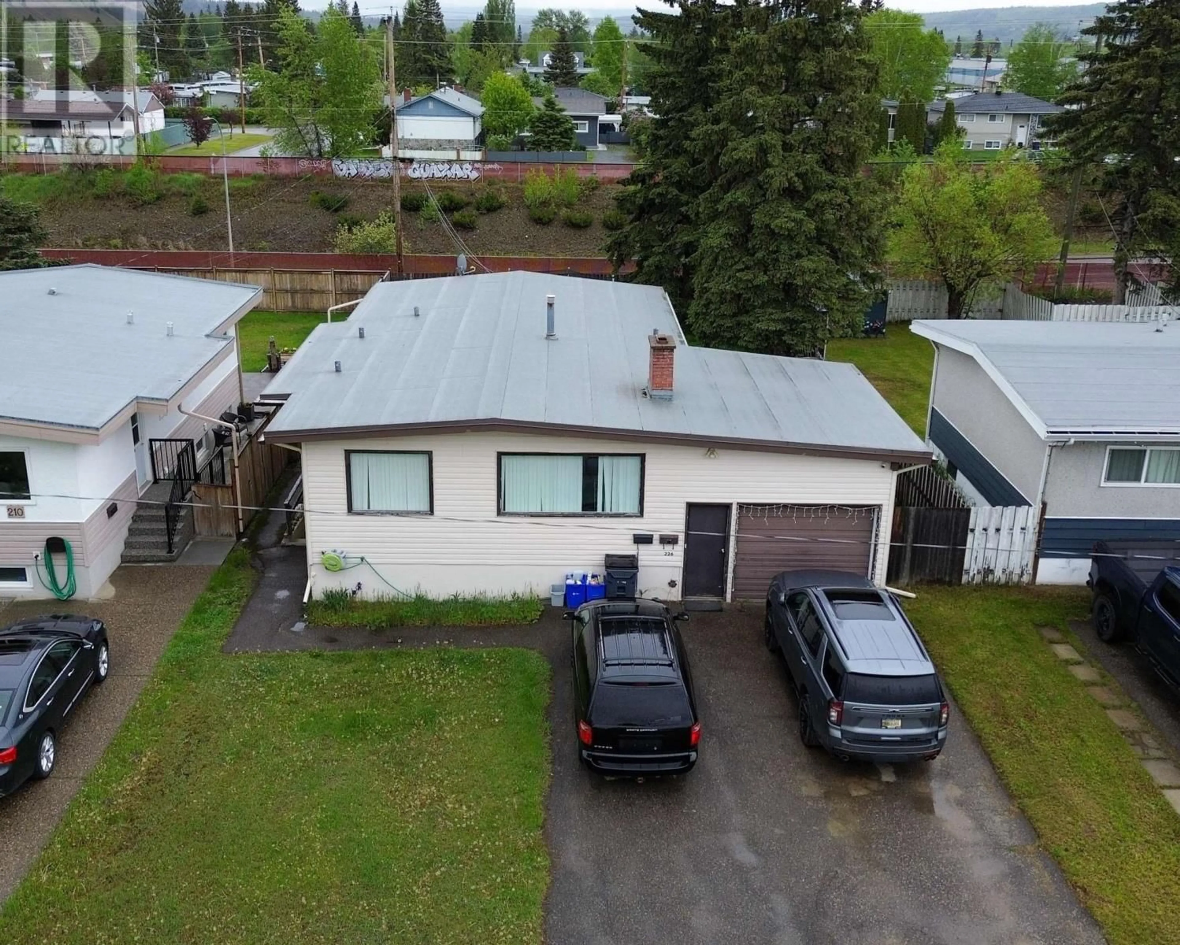 Frontside or backside of a home for 226 KELLY STREET, Prince George British Columbia V2M3K3