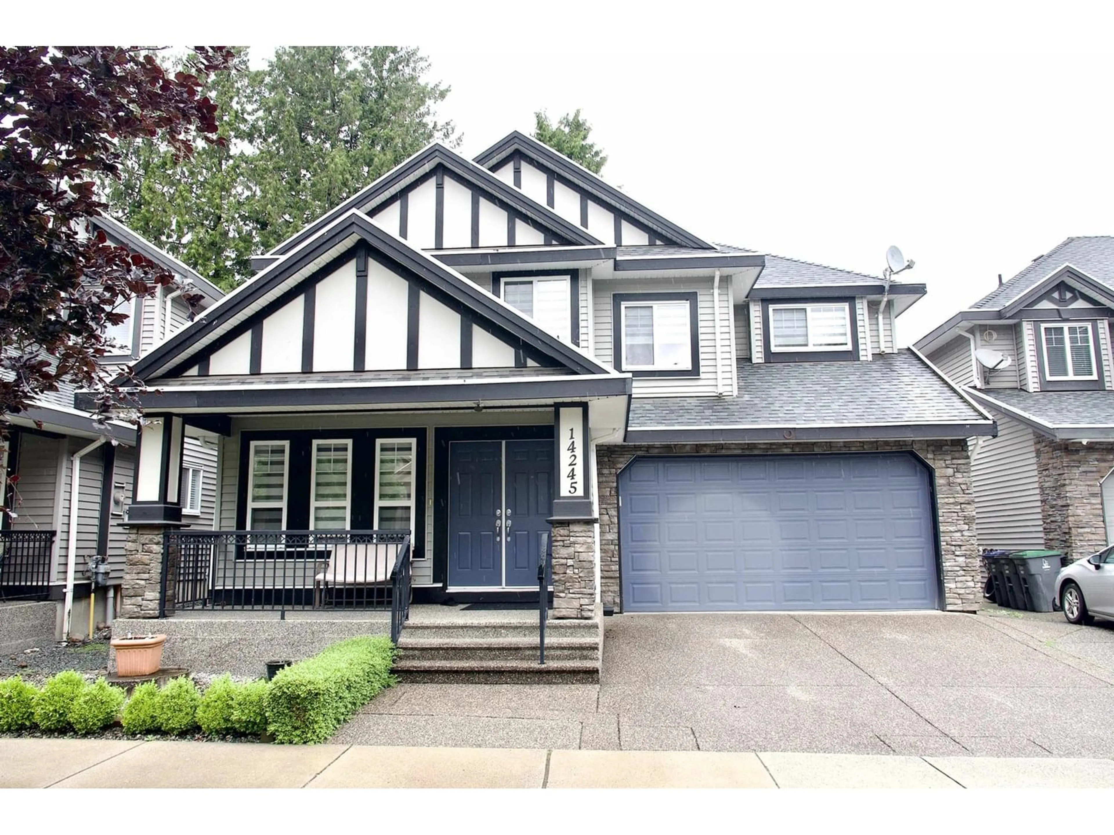 Frontside or backside of a home for 14245 64A AVENUE, Surrey British Columbia V3W1T3