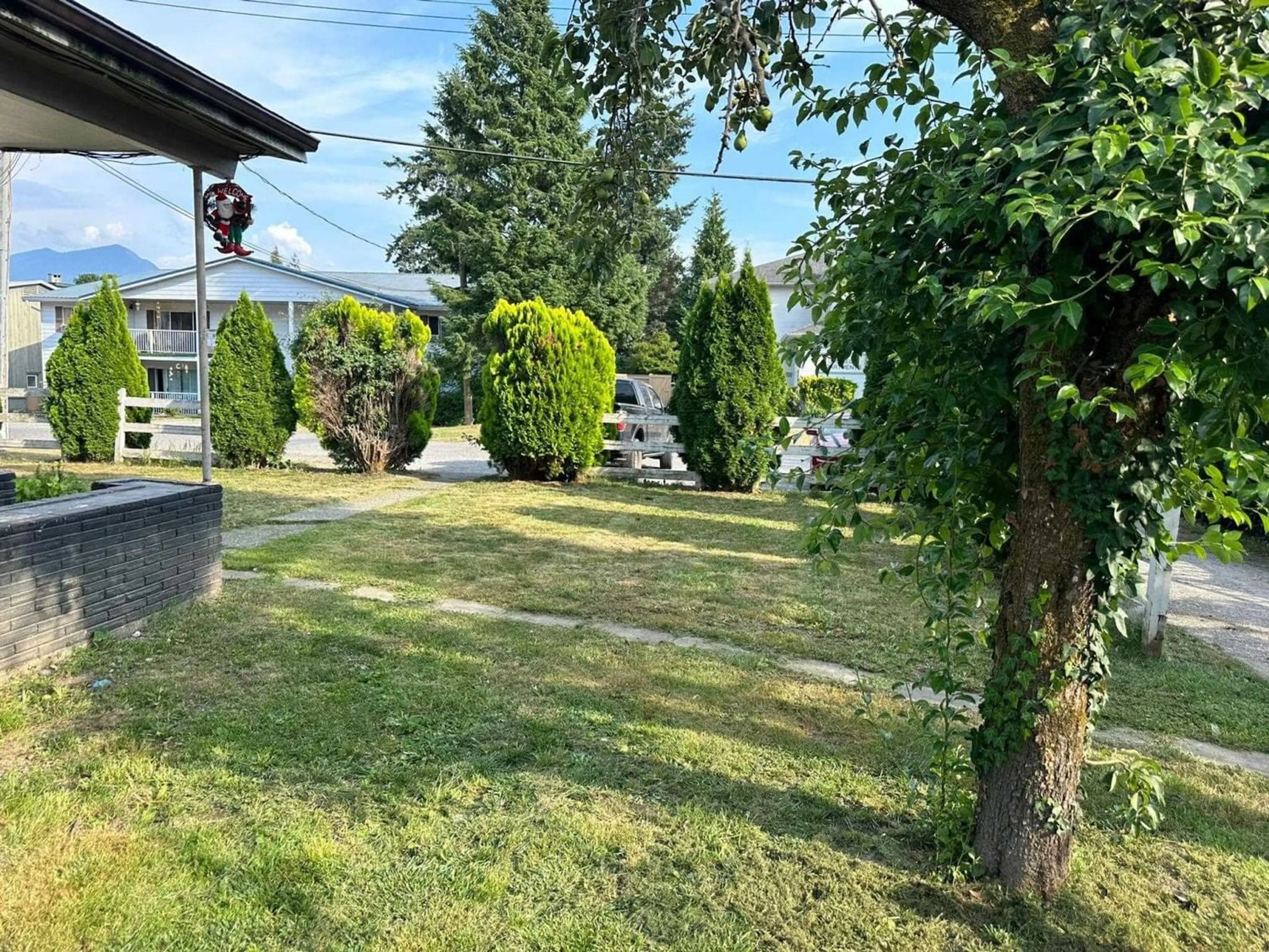 Frontside or backside of a home, the fenced backyard for 46167 CLEVELAND AVENUE, Chilliwack British Columbia V2P2X5