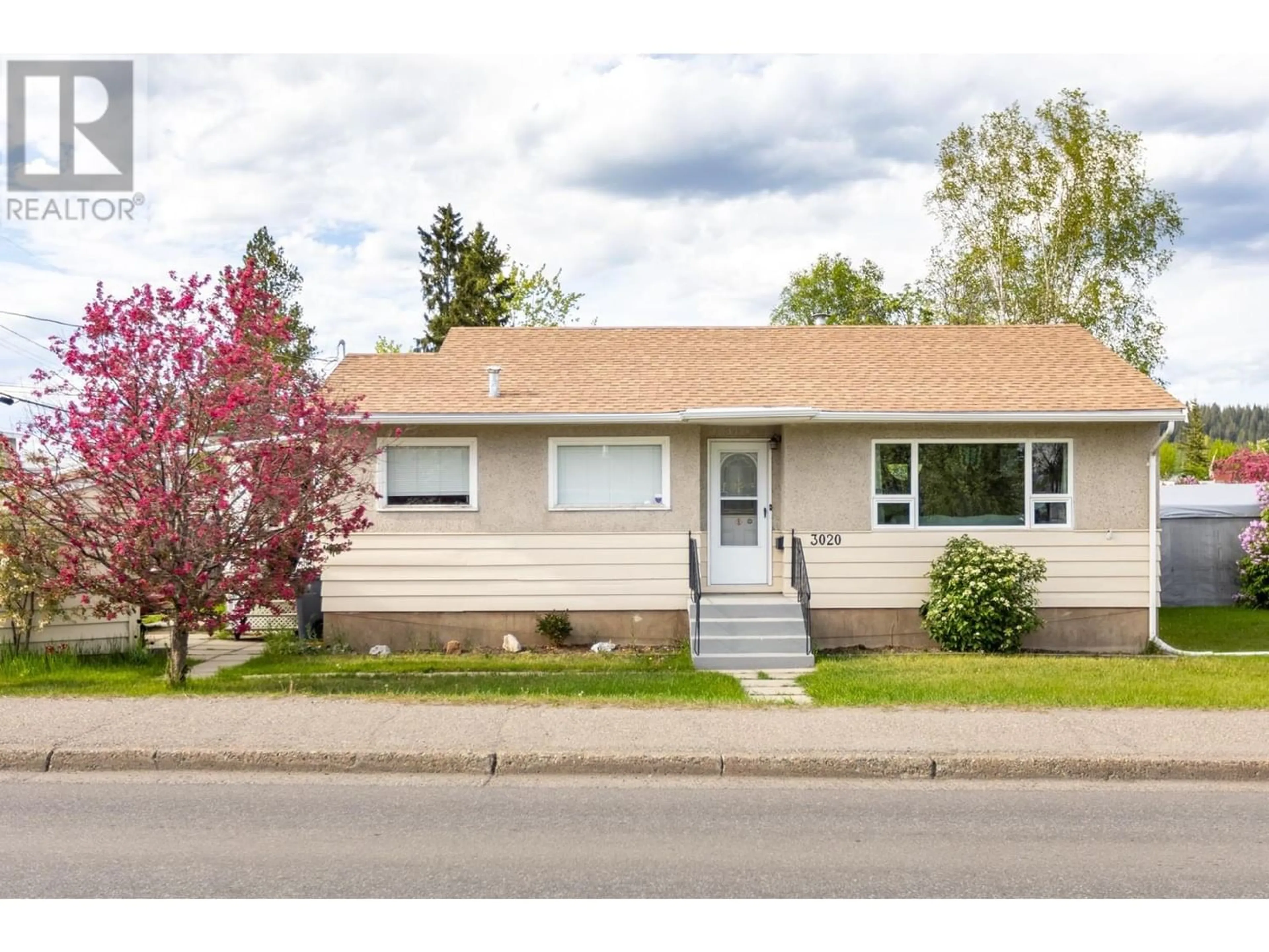 Frontside or backside of a home for 3020 5TH AVENUE, Prince George British Columbia V2M1K6