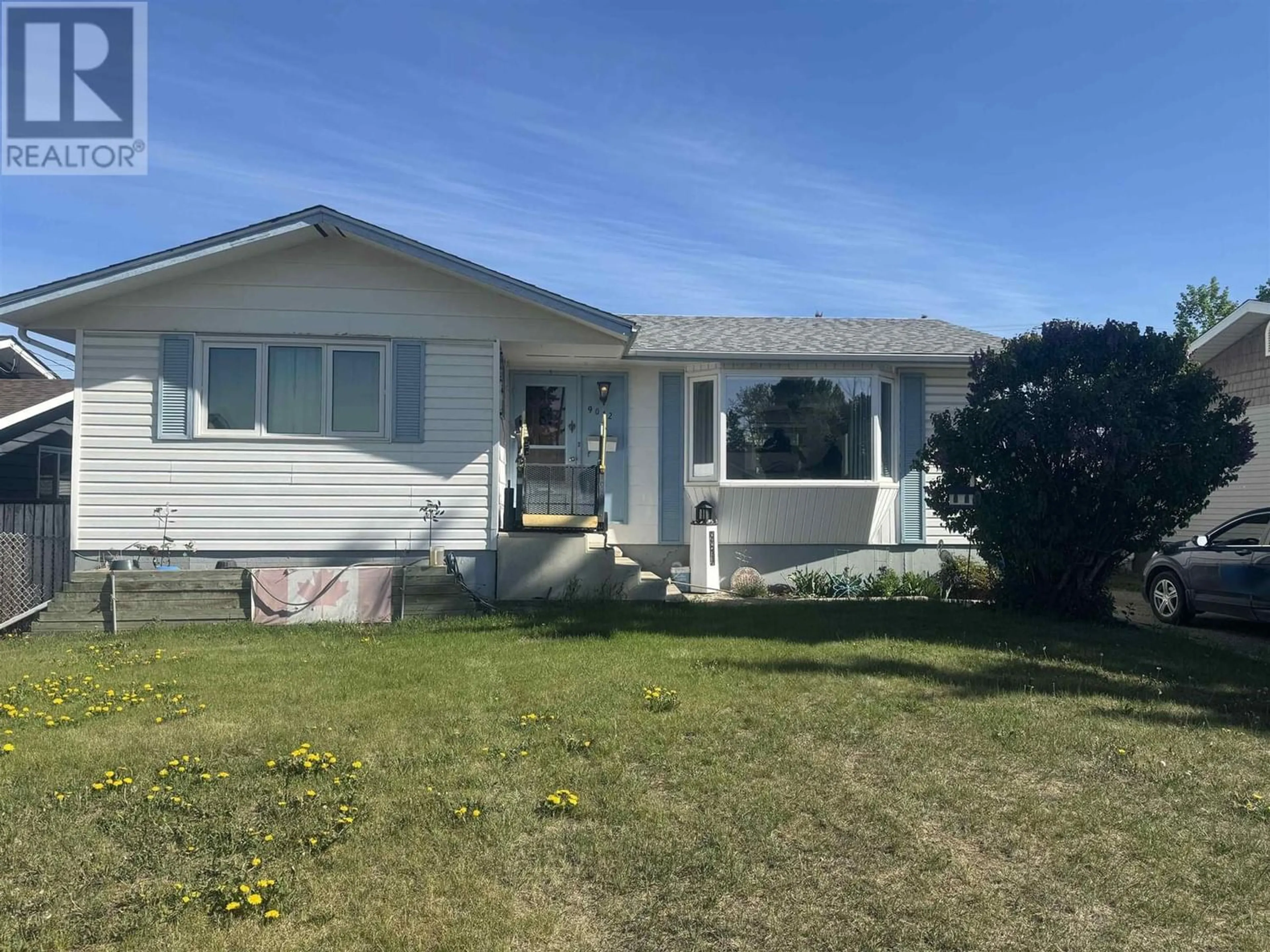Frontside or backside of a home for 9012 99 AVENUE, Fort St. John British Columbia V1J1T1