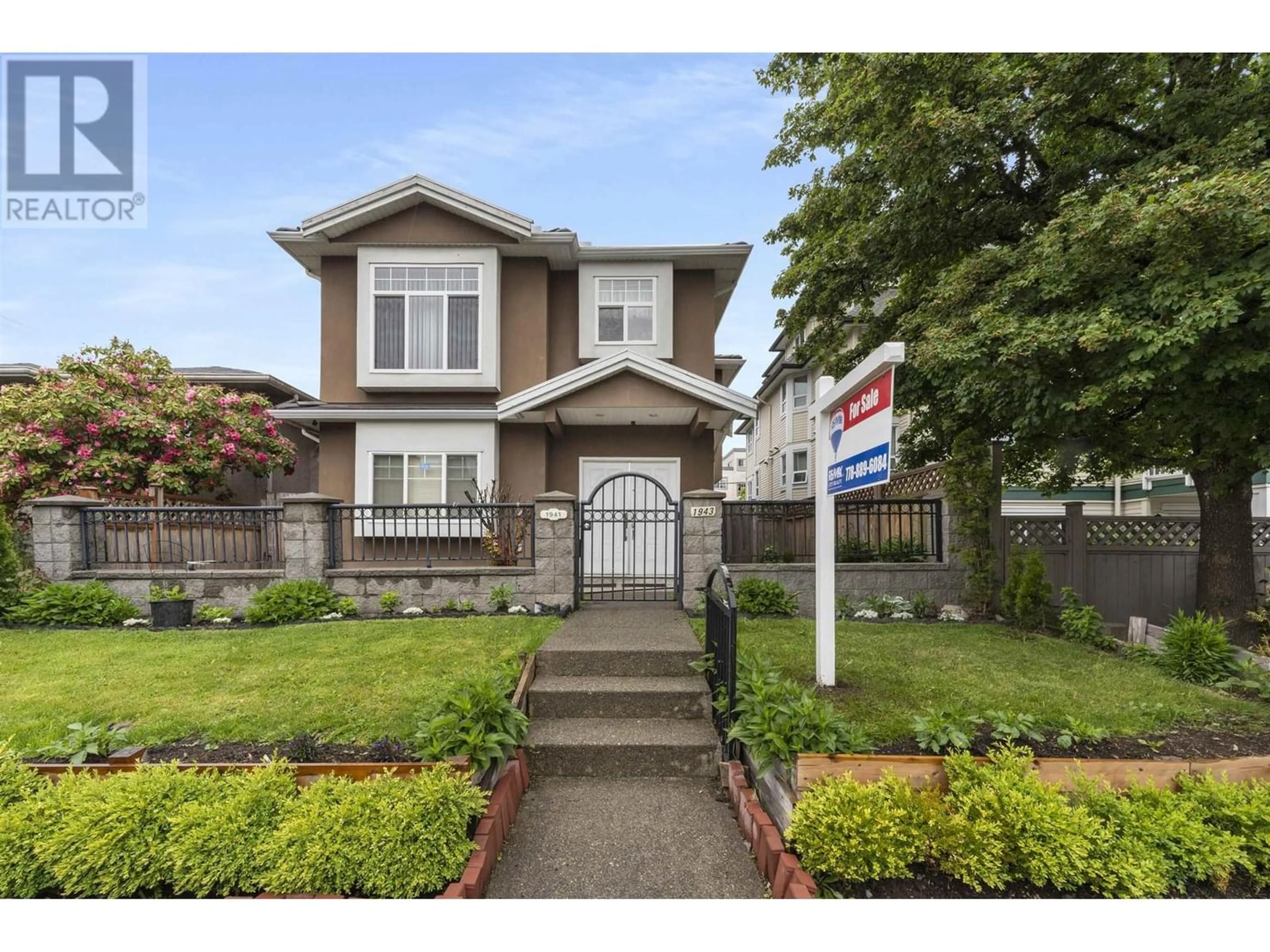 Frontside or backside of a home for 1943 E 12TH AVENUE, Vancouver British Columbia V5N2A6