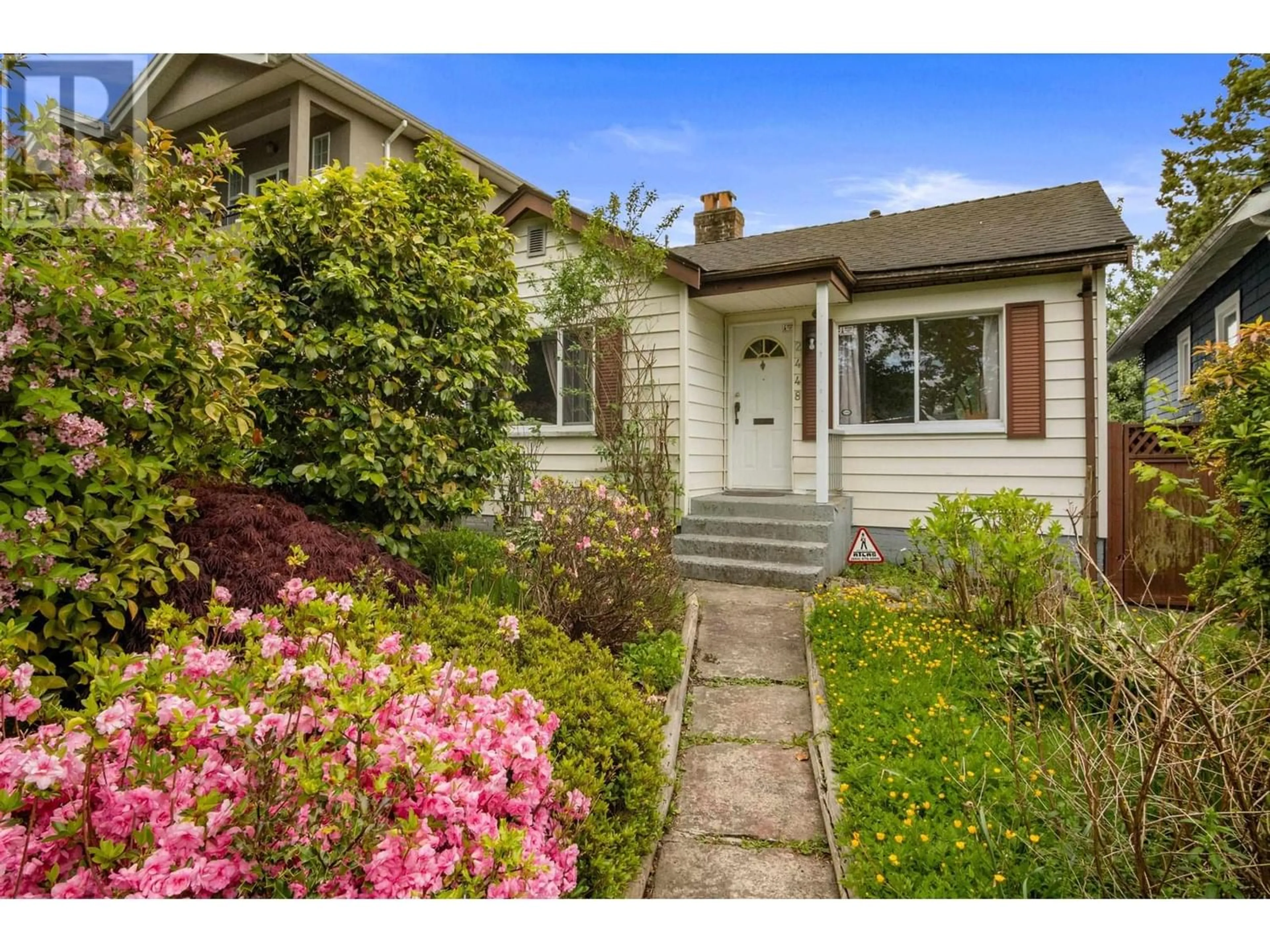 Frontside or backside of a home for 2448 EAST 29 AVENUE, Vancouver British Columbia V5R1T9