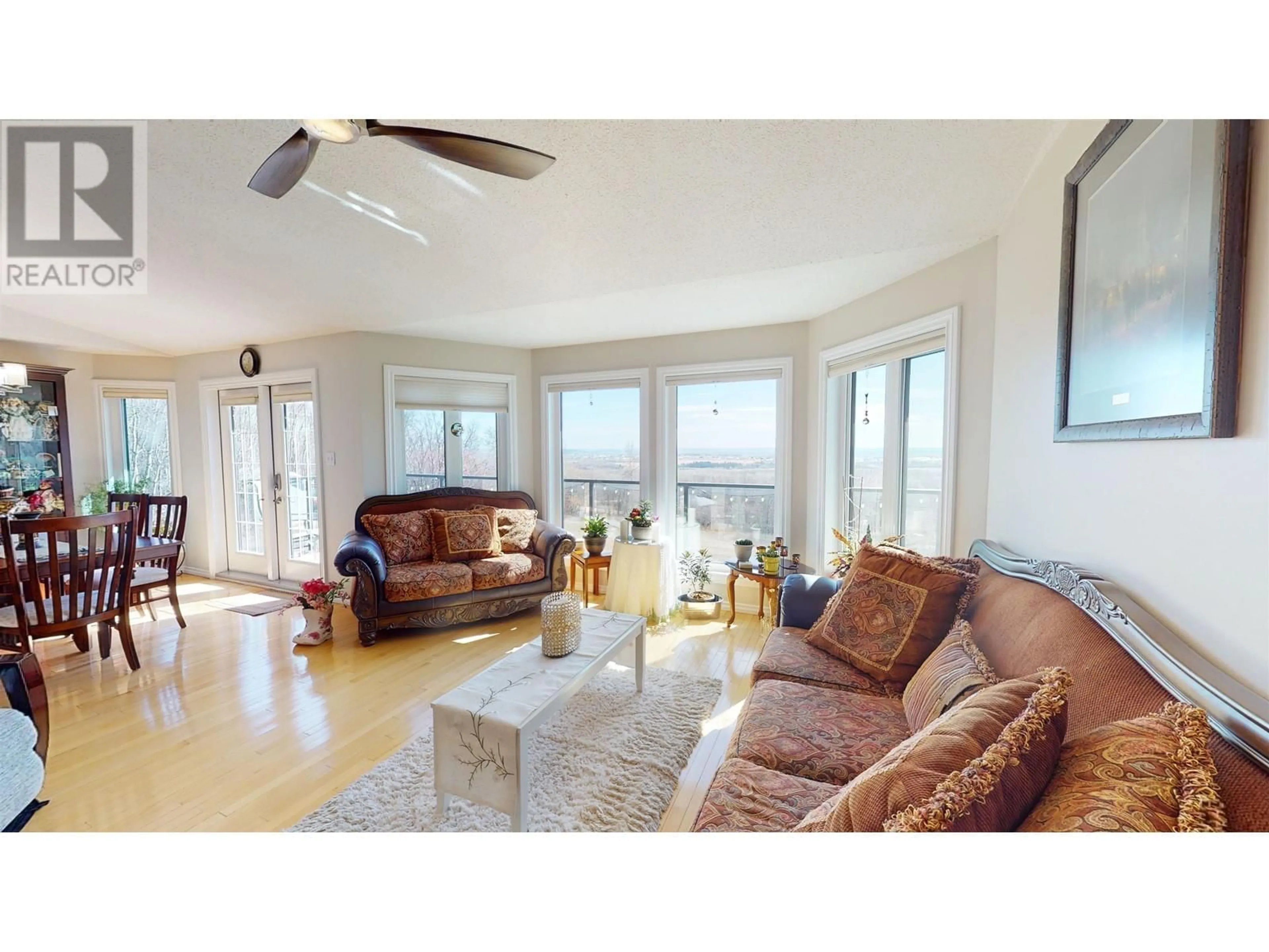 Living room, wood floors for 11822 244 ROAD, Fort St. John British Columbia V0C1H0