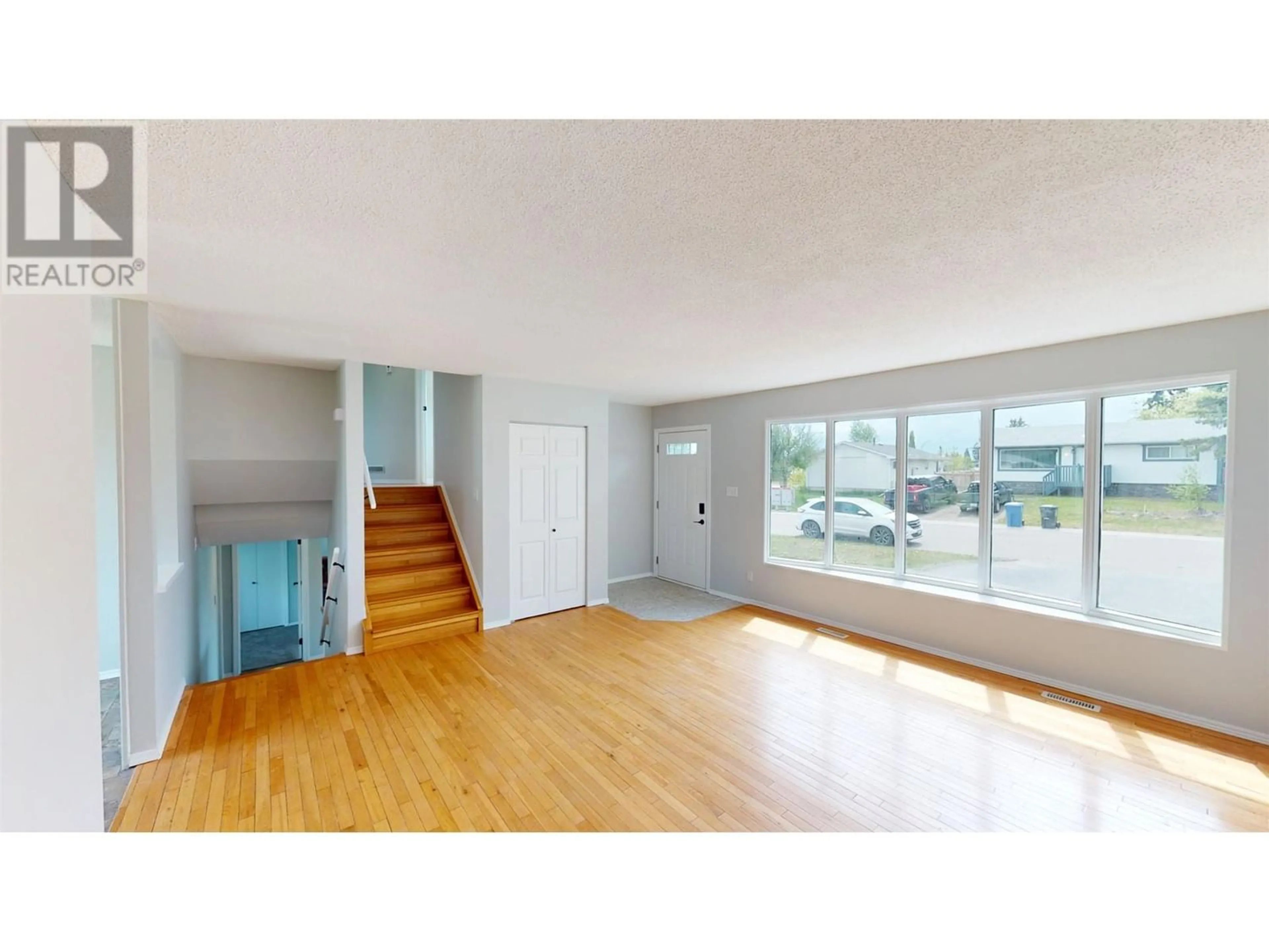 A pic of a room, wood floors for 8106 98 AVENUE, Fort St. John British Columbia V1J1P3