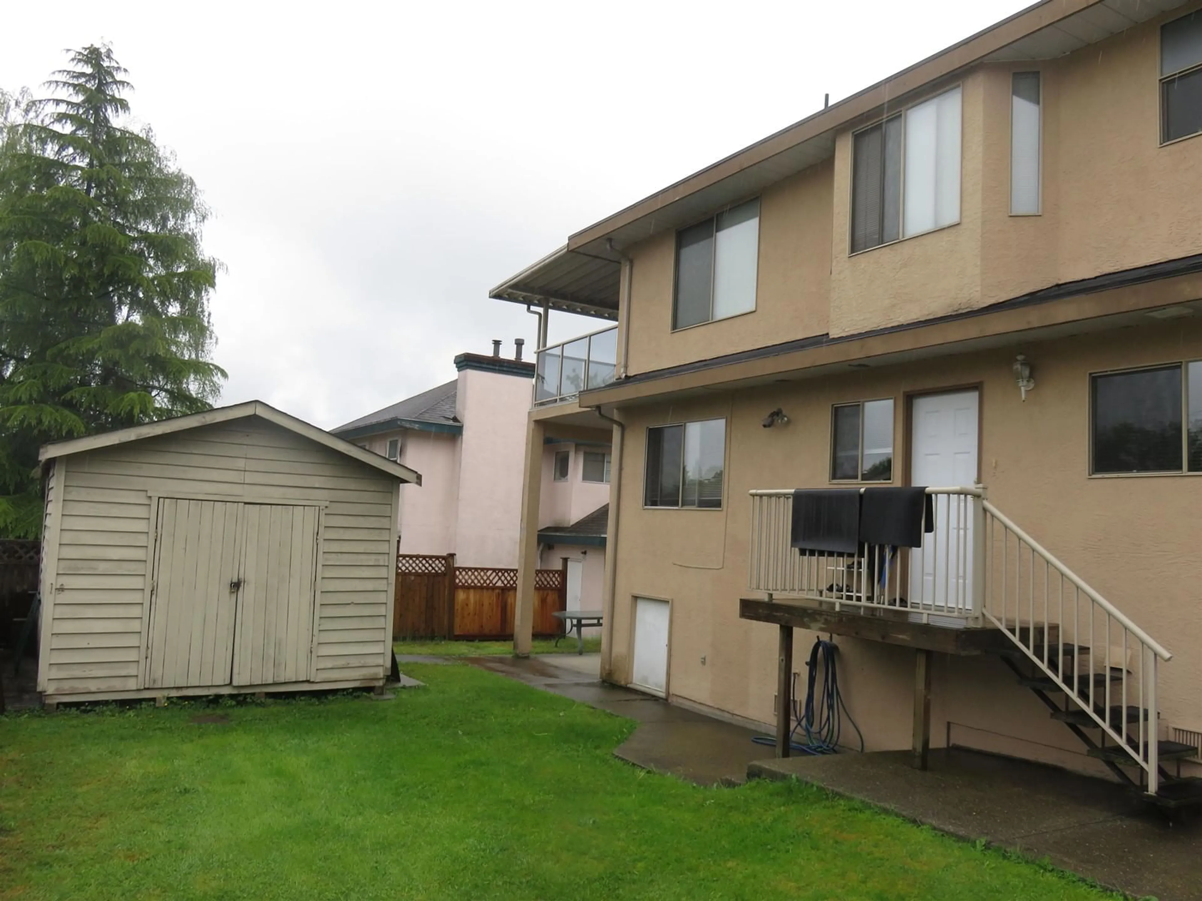 Frontside or backside of a home for 16287 95A AVENUE, Surrey British Columbia V4N2B9