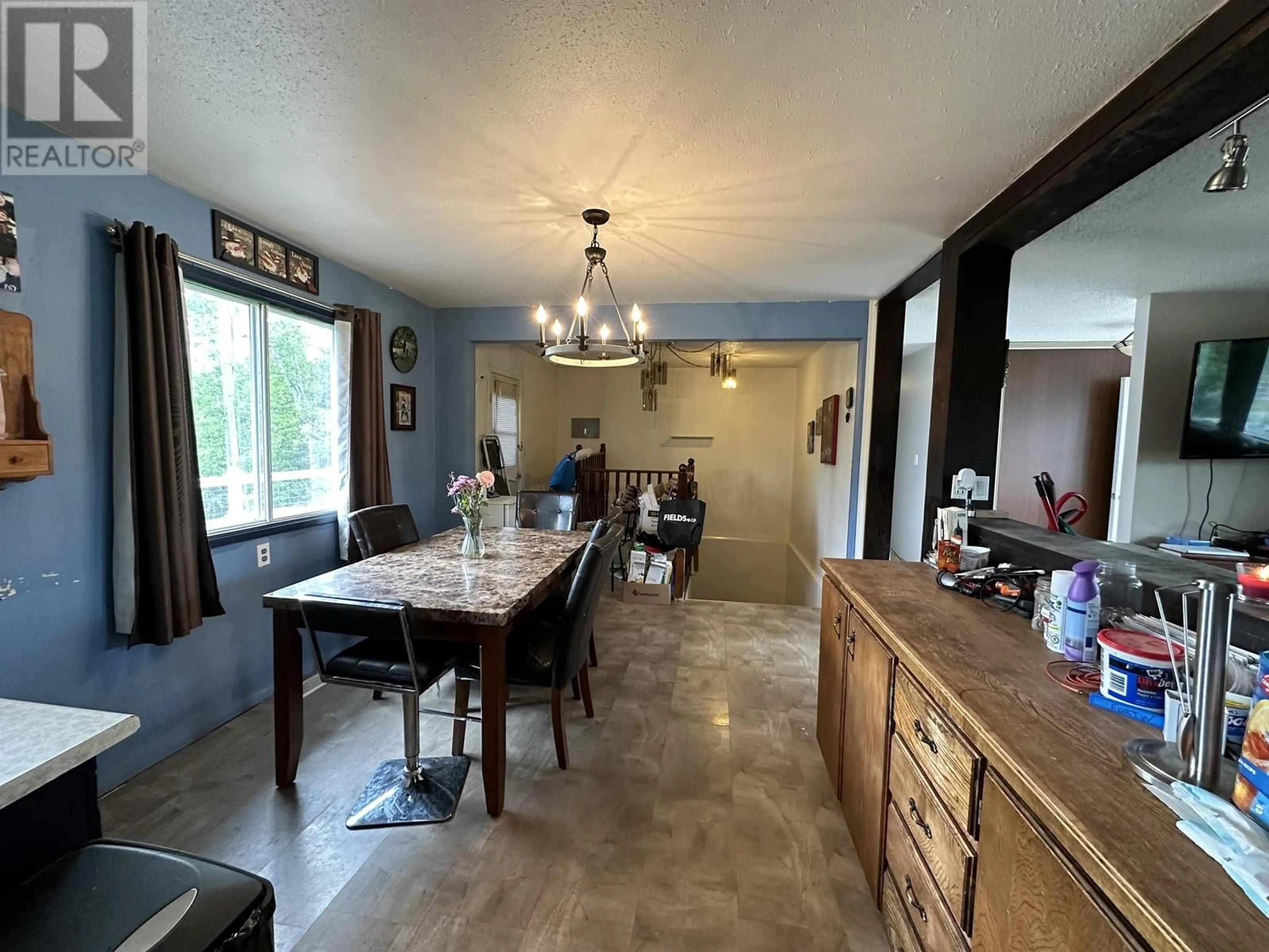 Dining room, cement floor, cottage for 11515 CARTER STREET, Hudsons Hope British Columbia V0C1V0