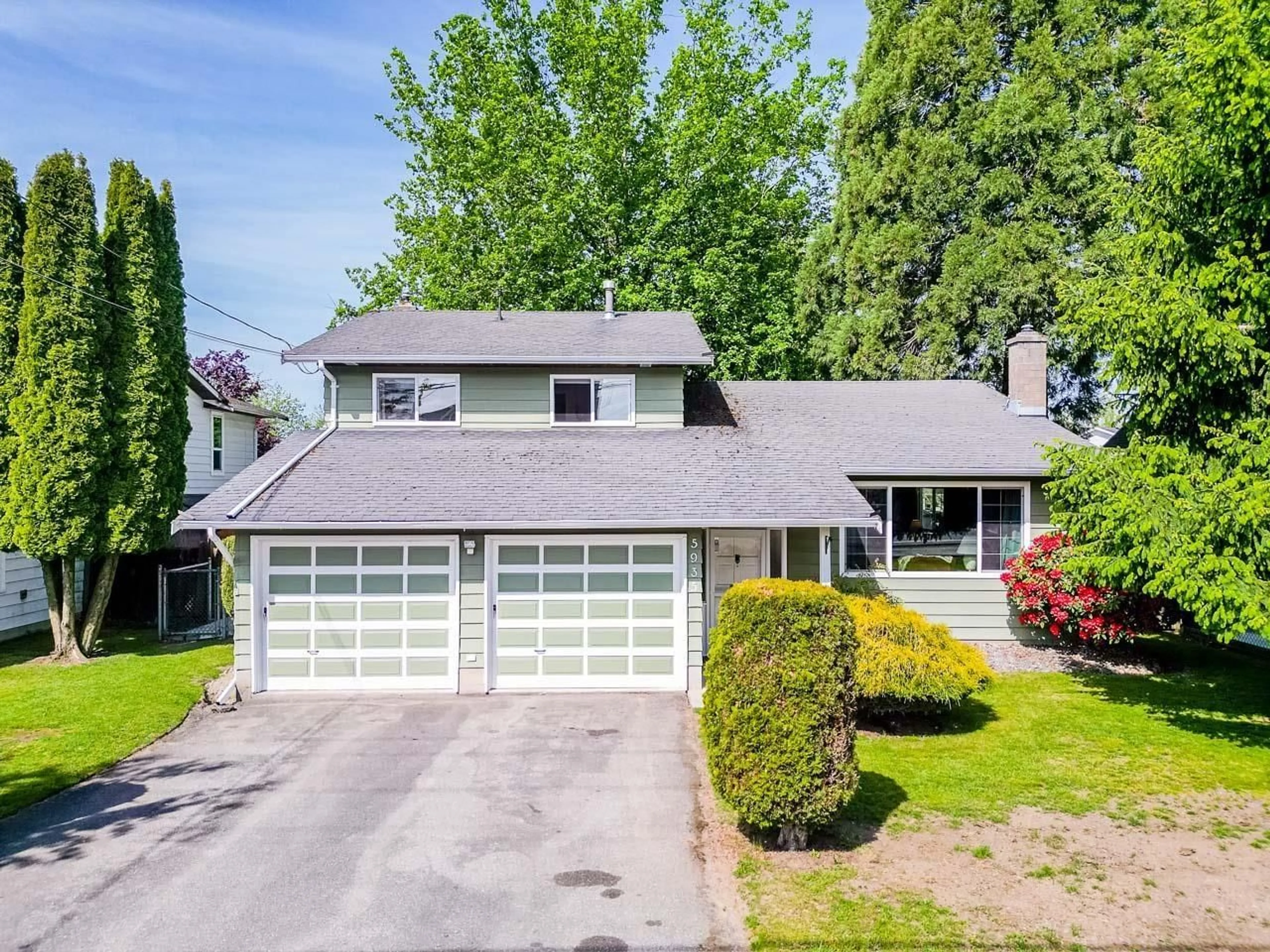 Frontside or backside of a home for 5935 184 STREET, Surrey British Columbia V3S4N2