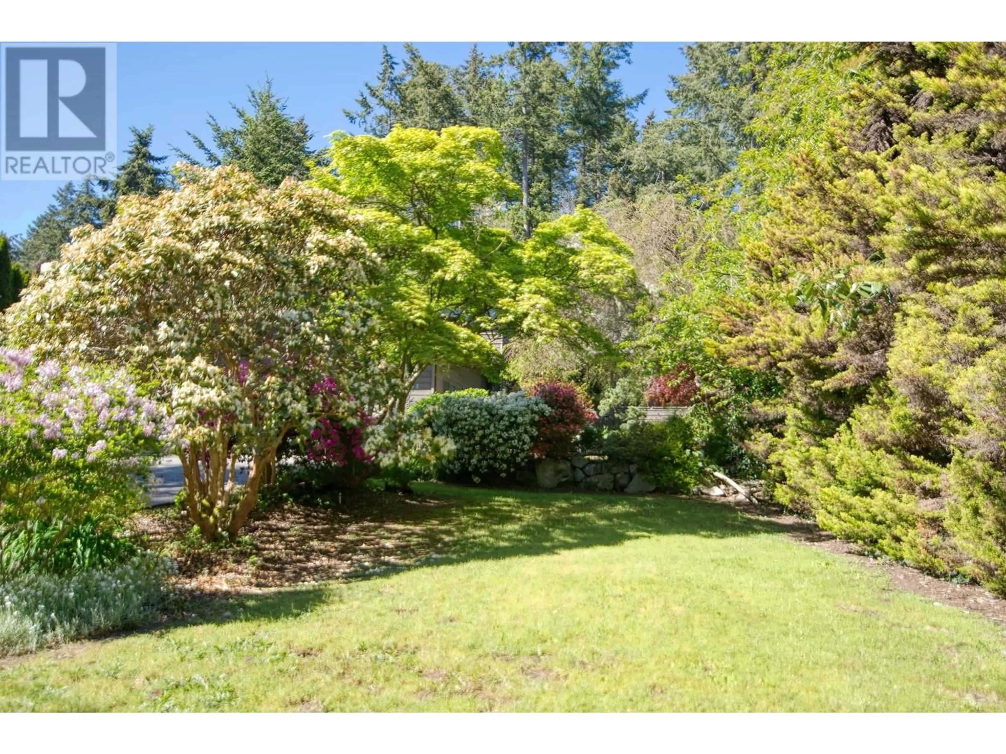 Patio, the fenced backyard for 7104 DALE ROAD, Sechelt British Columbia V7Z0N2