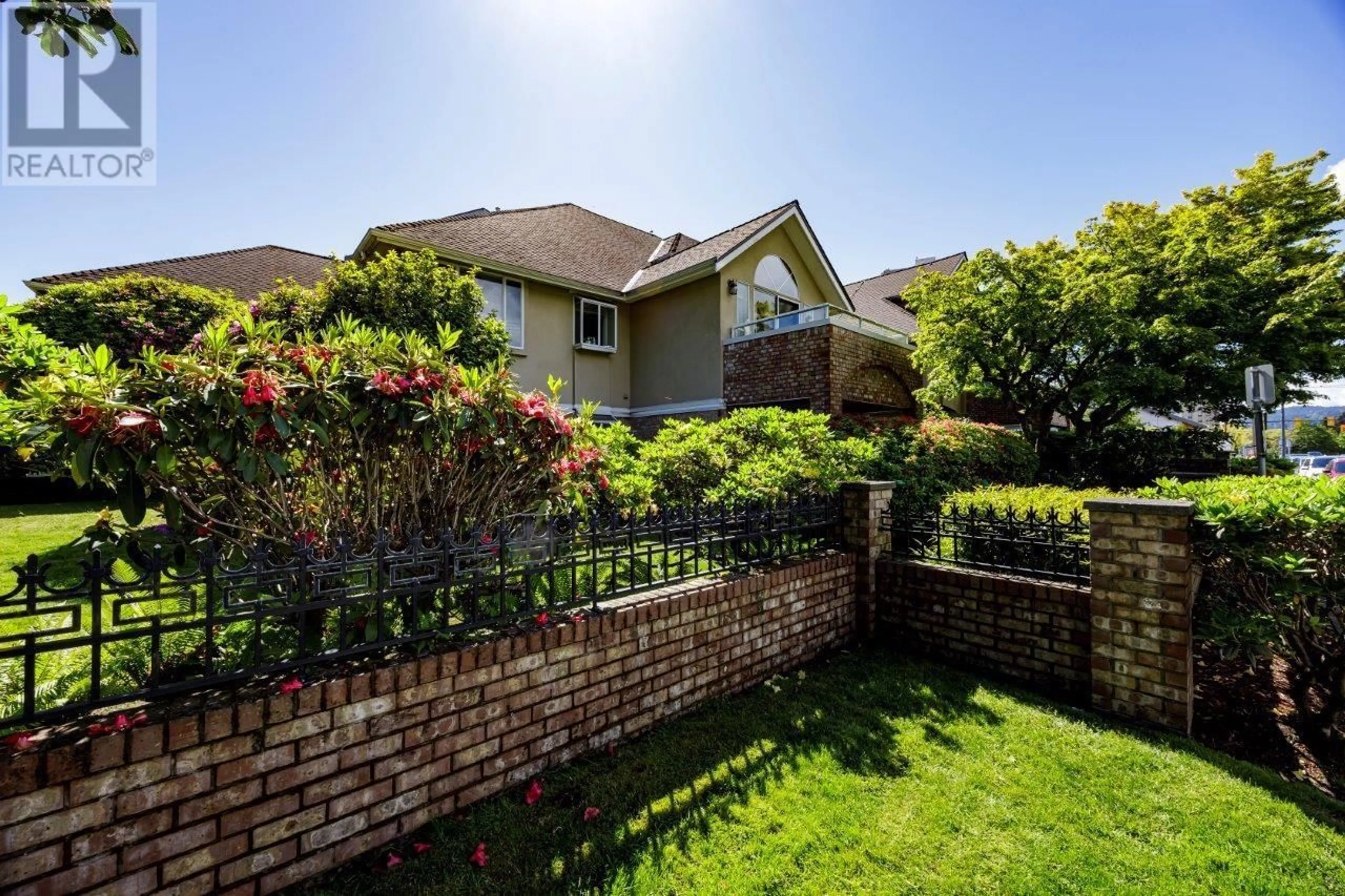 A pic from exterior of the house or condo, the fenced backyard for 17 2150 MARINE DRIVE, West Vancouver British Columbia V7V1K3