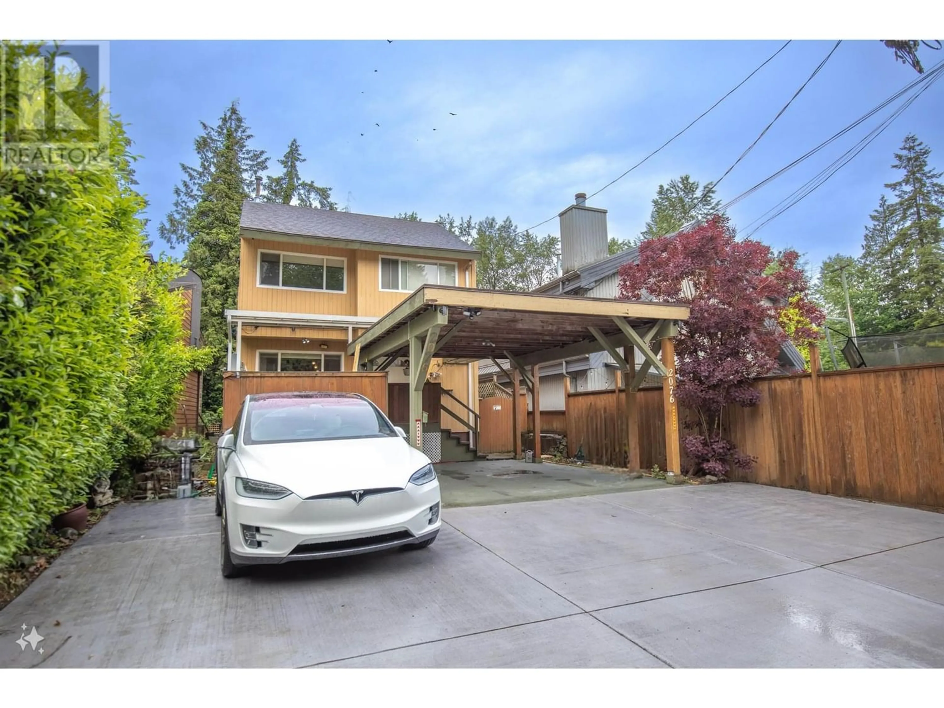 Frontside or backside of a home for 2076 CAPILANO ROAD, North Vancouver British Columbia V7P3B8