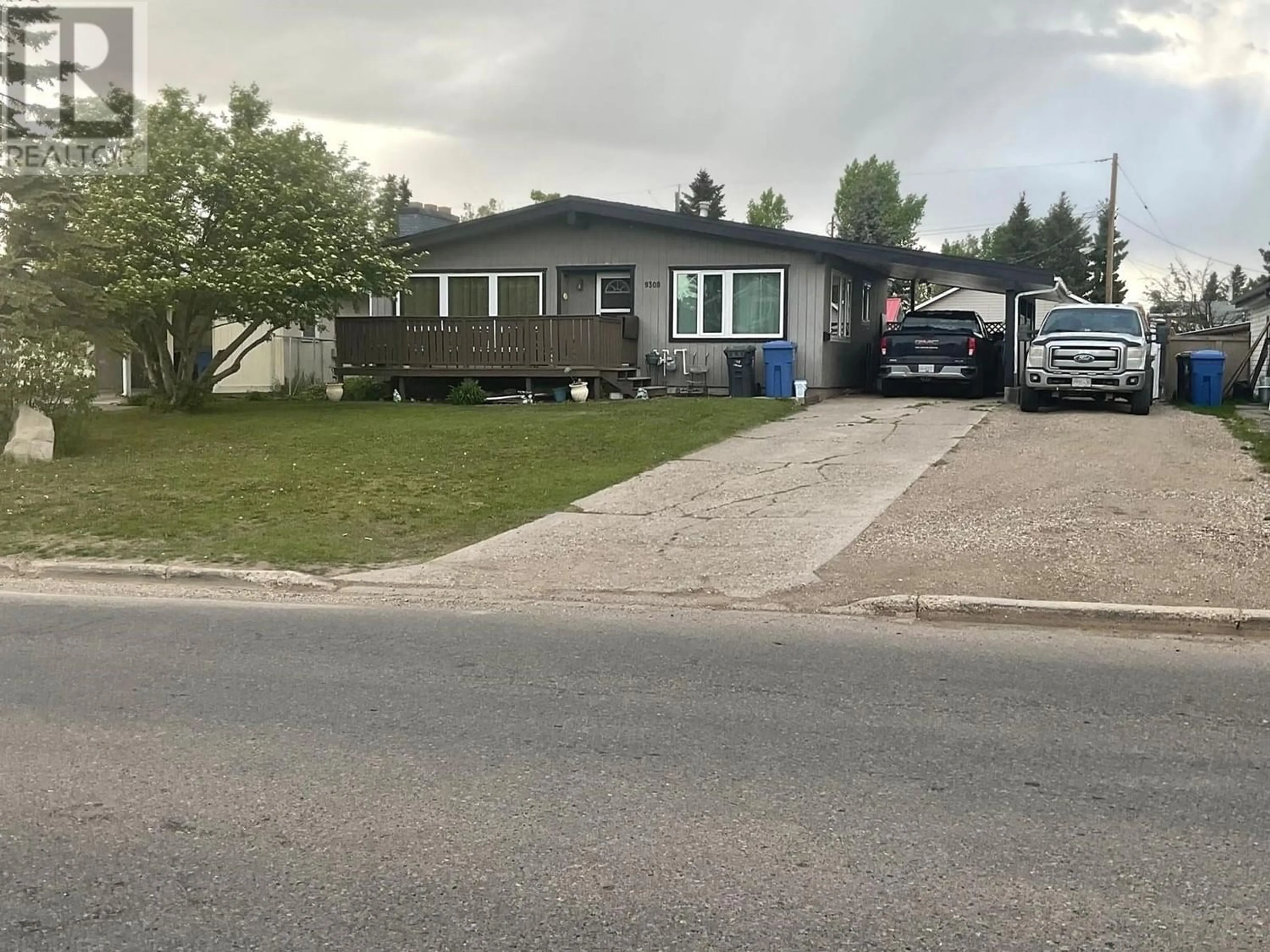 Frontside or backside of a home for 9308 112 AVENUE, Fort St. John British Columbia V1J2V9