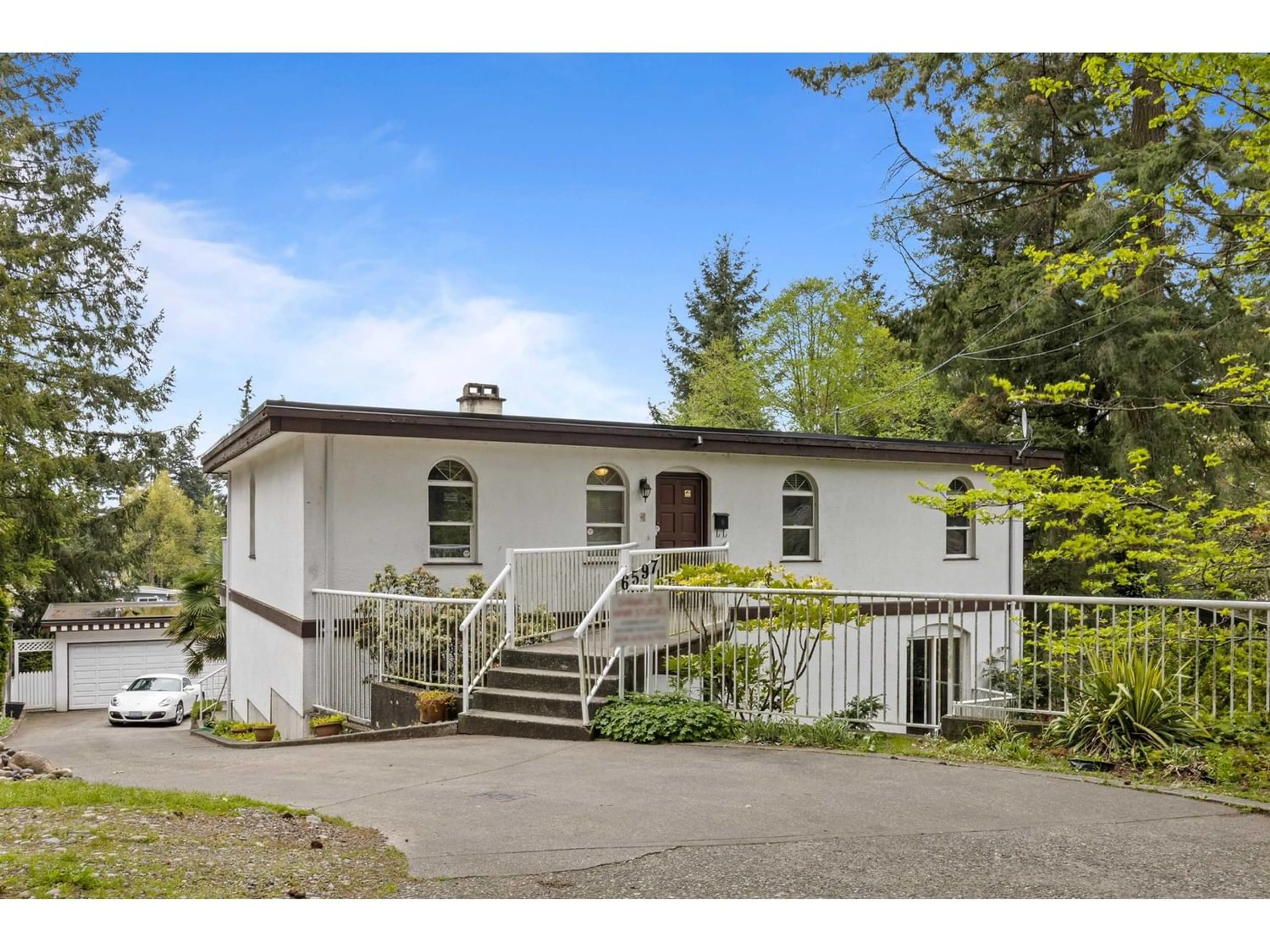 Frontside or backside of a home for 6597 FABER CRESCENT, Delta British Columbia V4E1K1