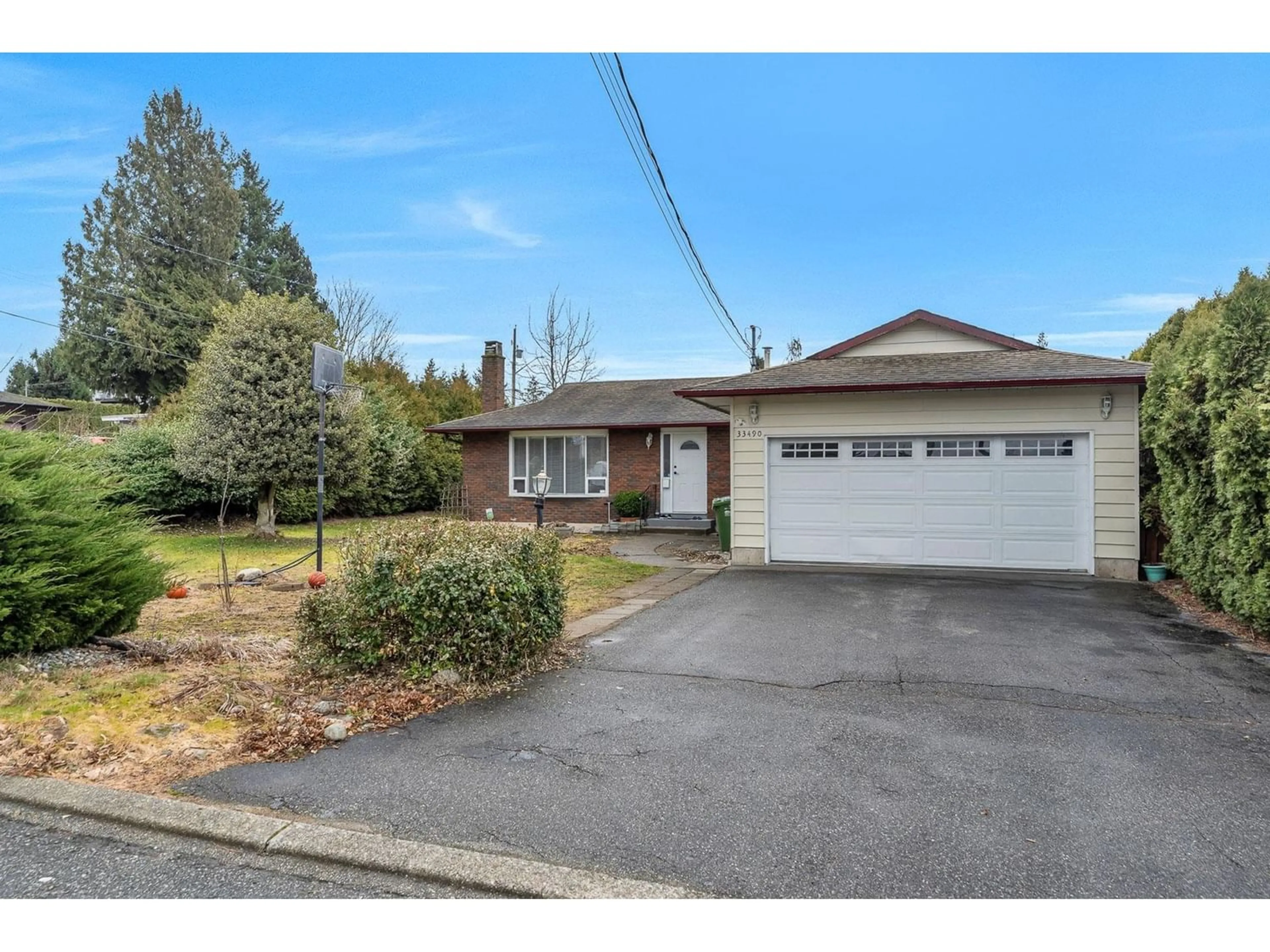 Frontside or backside of a home for 33490 KIRK AVENUE, Abbotsford British Columbia V2S5Y9