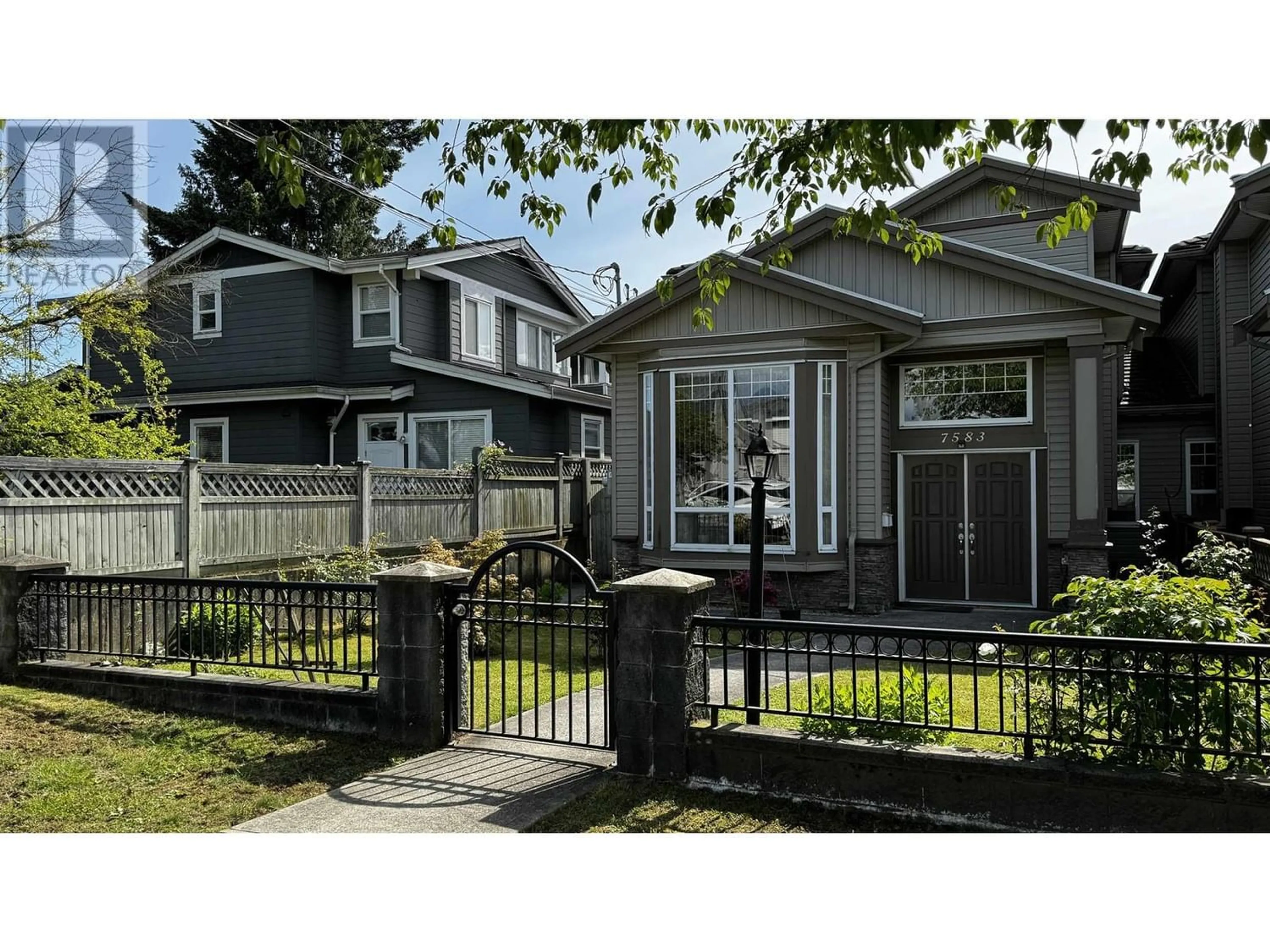 Frontside or backside of a home for 7583 WRIGHT STREET, Burnaby British Columbia V3N3W8