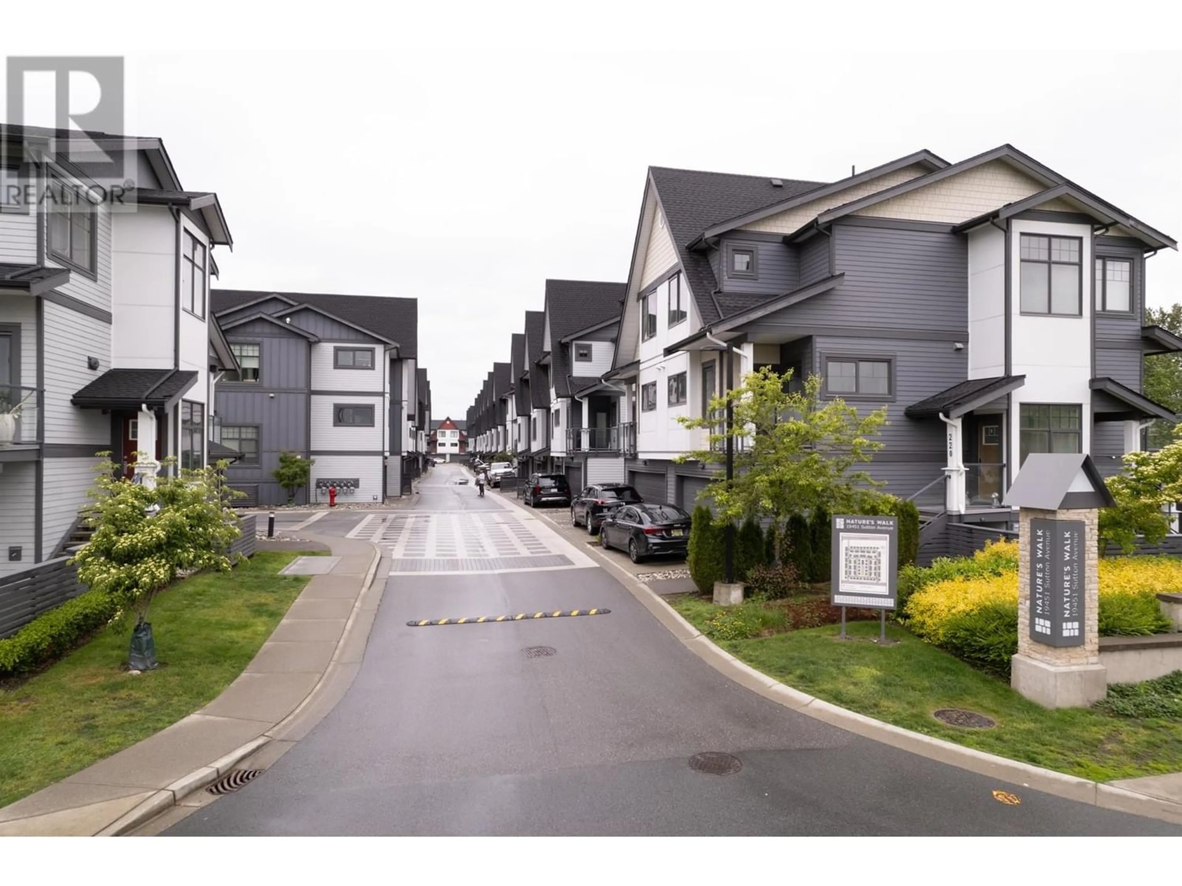 A pic from exterior of the house or condo, the street view for 210 19451 SUTTON AVENUE, Pitt Meadows British Columbia V3Y0G6